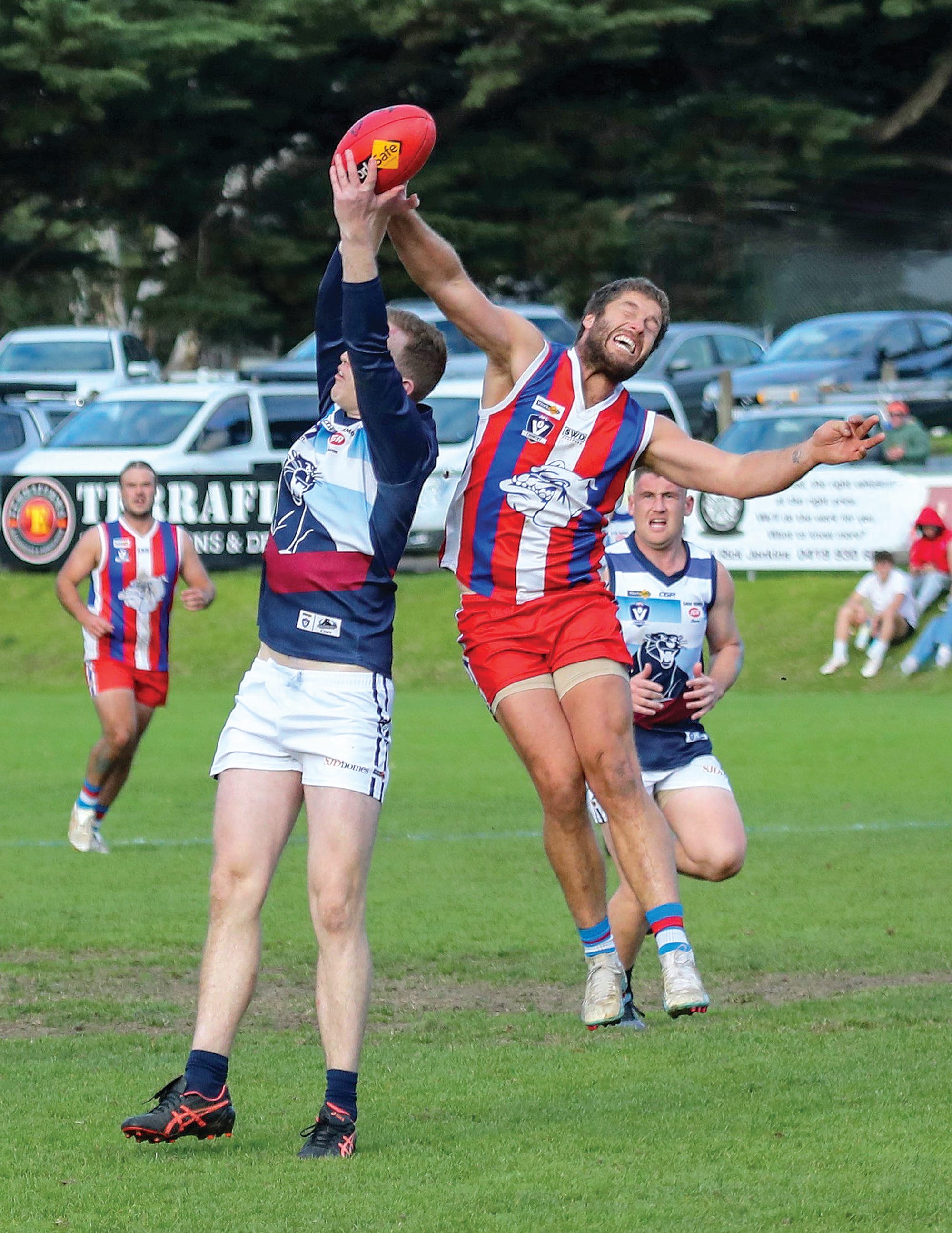 Travis Woodfield clashes in the ruck.