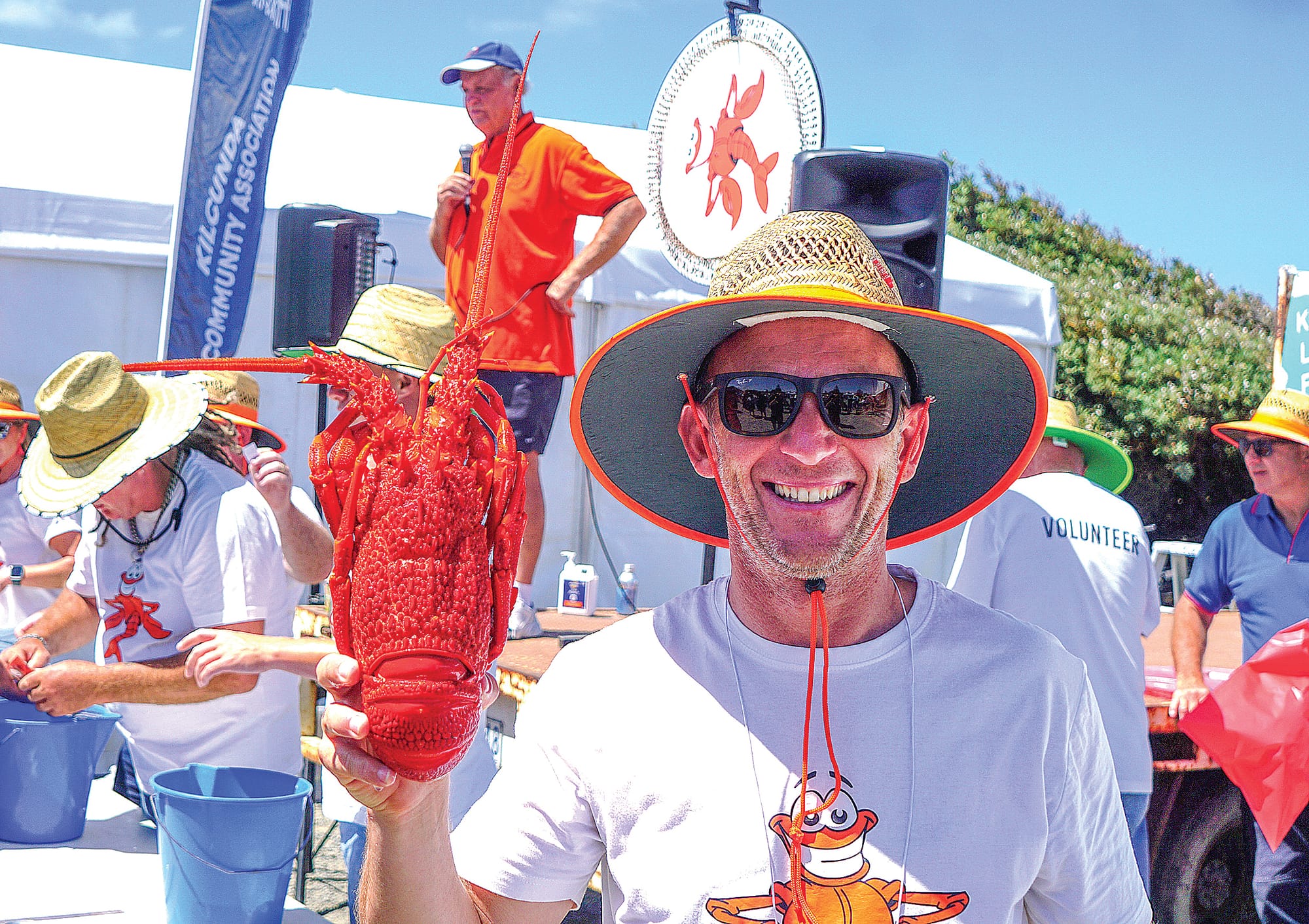 Drew holds up the raffle-winning lobster. Ns11_0425