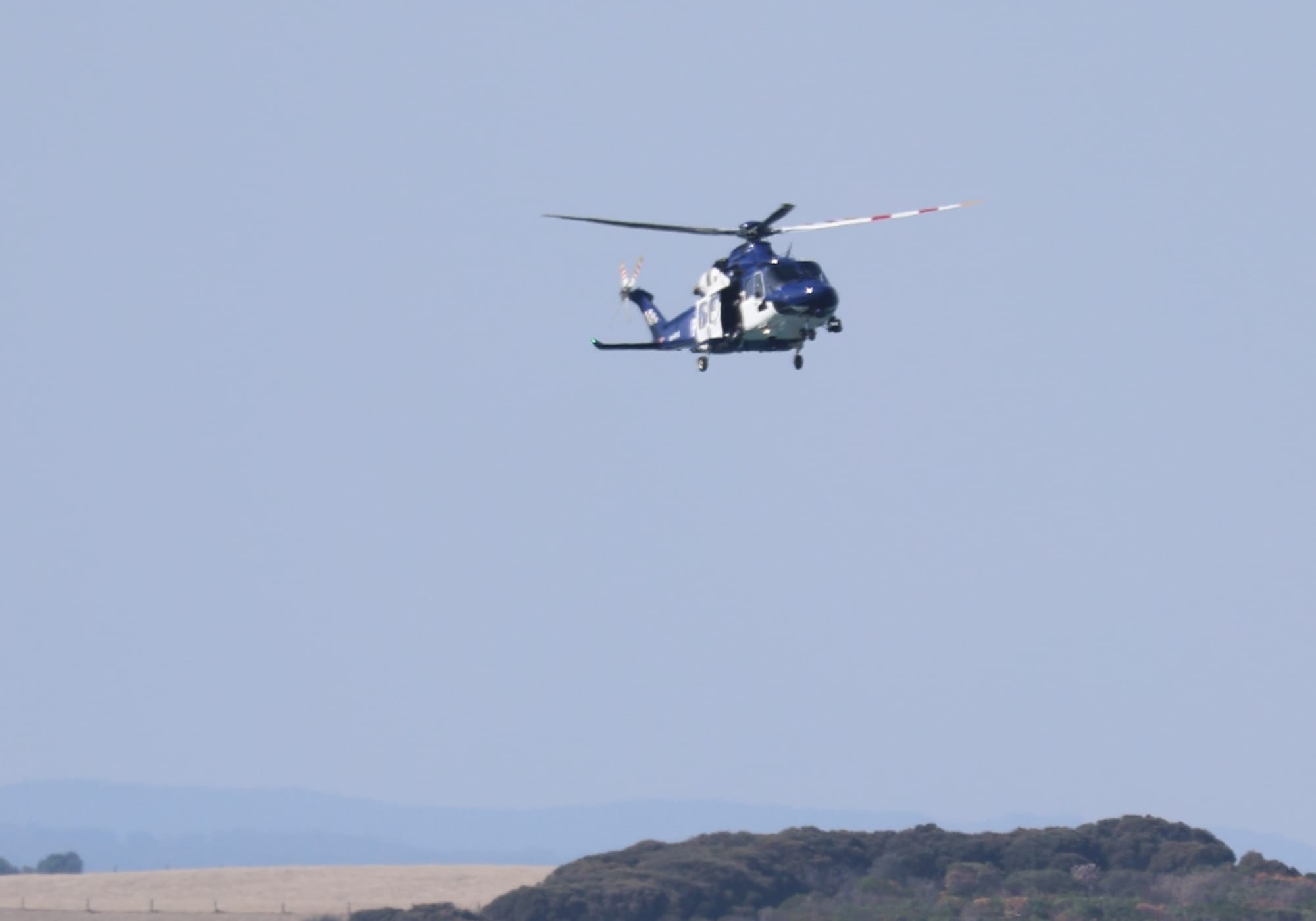 Search continues for male swept off rocks at Punch Bowl