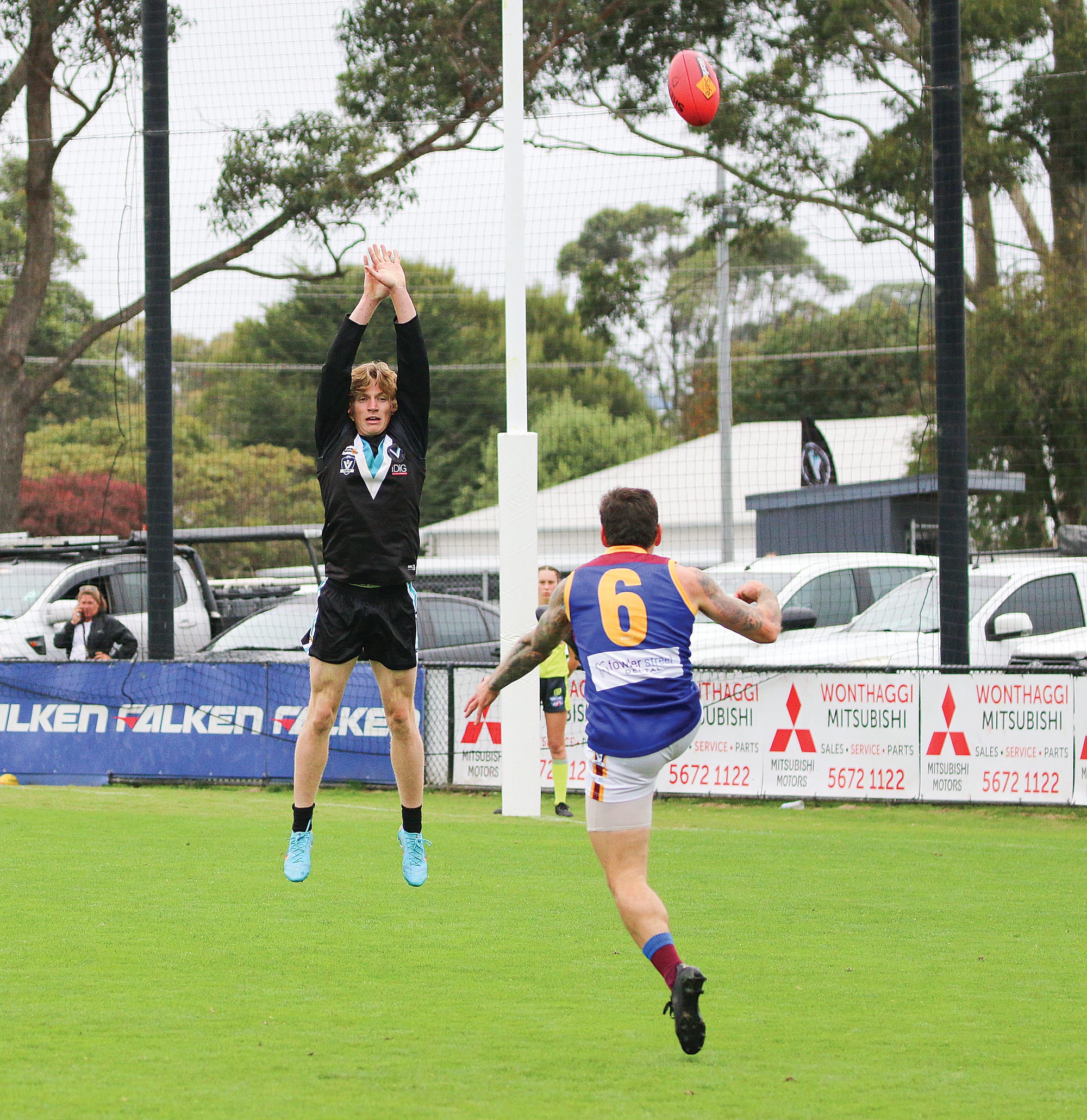 Isaac Chug one of Powers best on the day defends a shot at goal by one of Moe’s best on the day, Jacob Wood. 