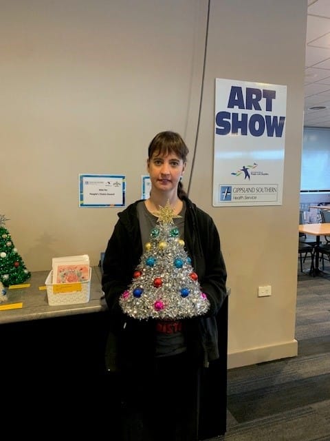 Kelly Tichborne with one of her Christmas Trees