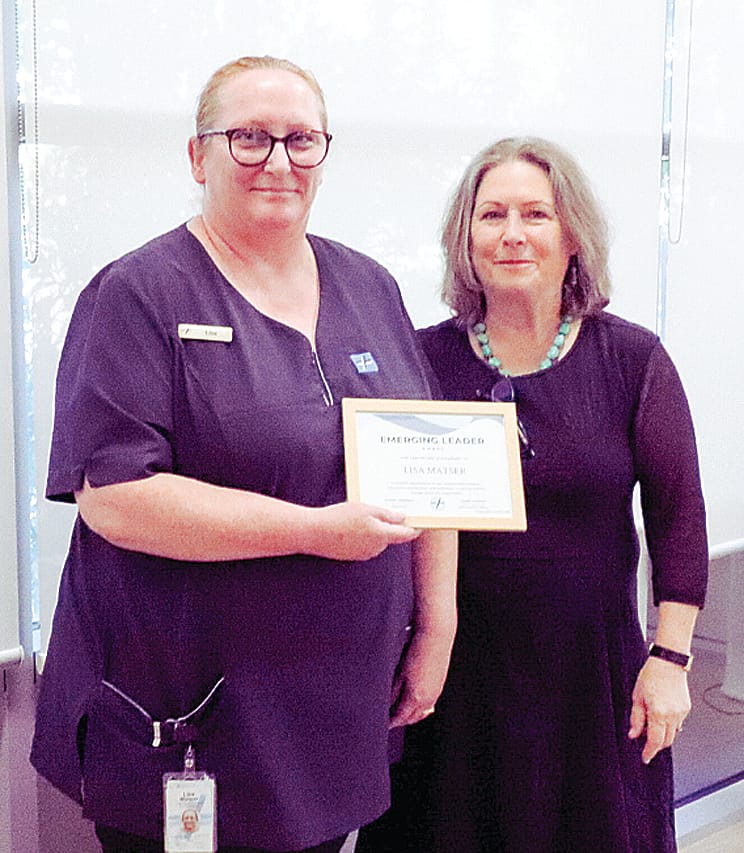 Lisa Matser was awarded the Emerging Leader Award, pictured with Gwen Scheffer (Community Advisory Committee Chair).