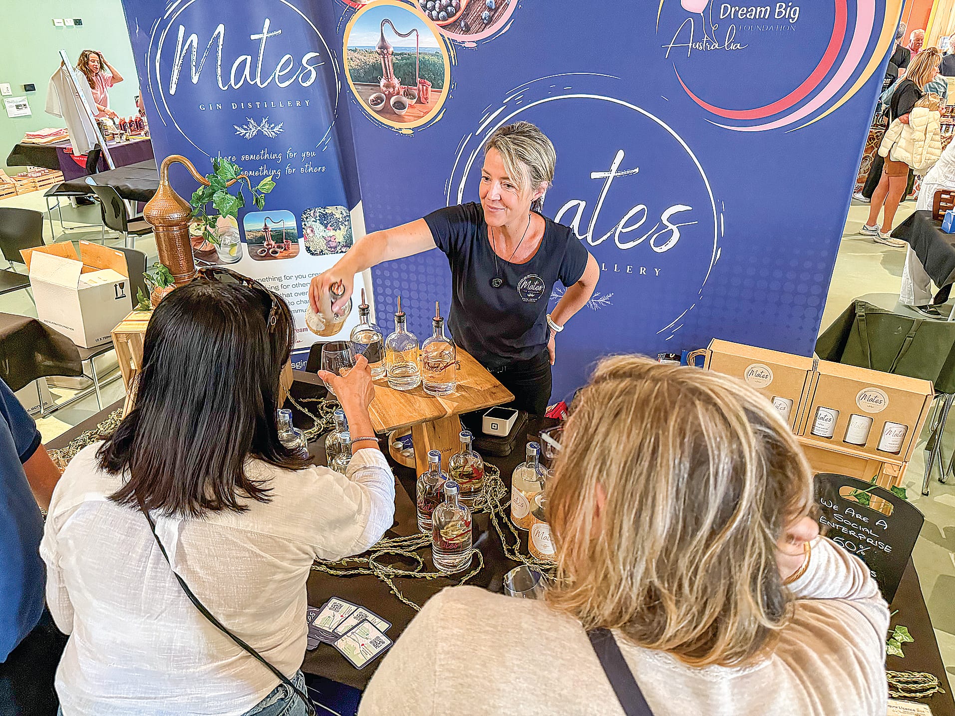 Kim Richardson of Mates Gin Distillery in Wonthaggi provides samples of her fine selection of locally distilled gins at Sunday’s food festival at Cowes.
