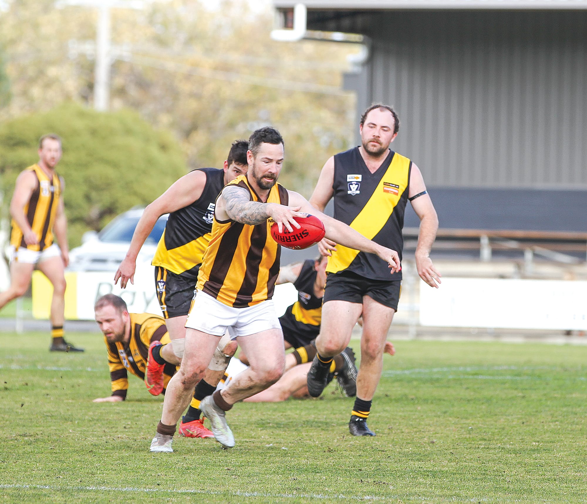 Morwell East’s Ben Marks takes the ball forward at the Foster Showgrounds in a reserves match dominated by the Hawks. B63_3125