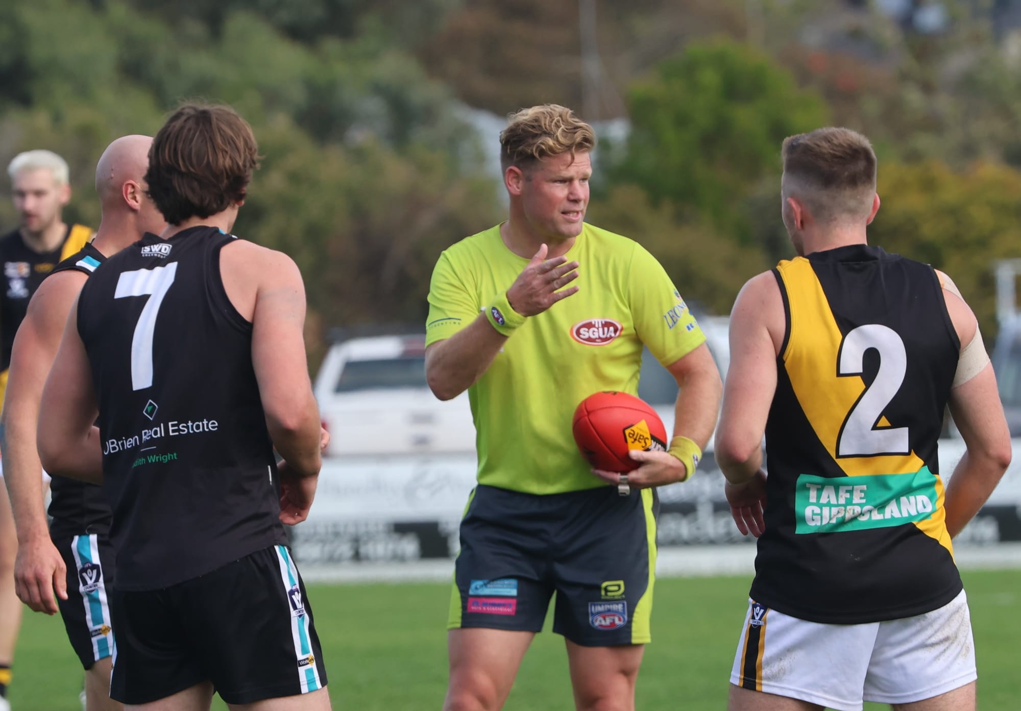 Umpire Jesse Boyd runs out for 300 games today