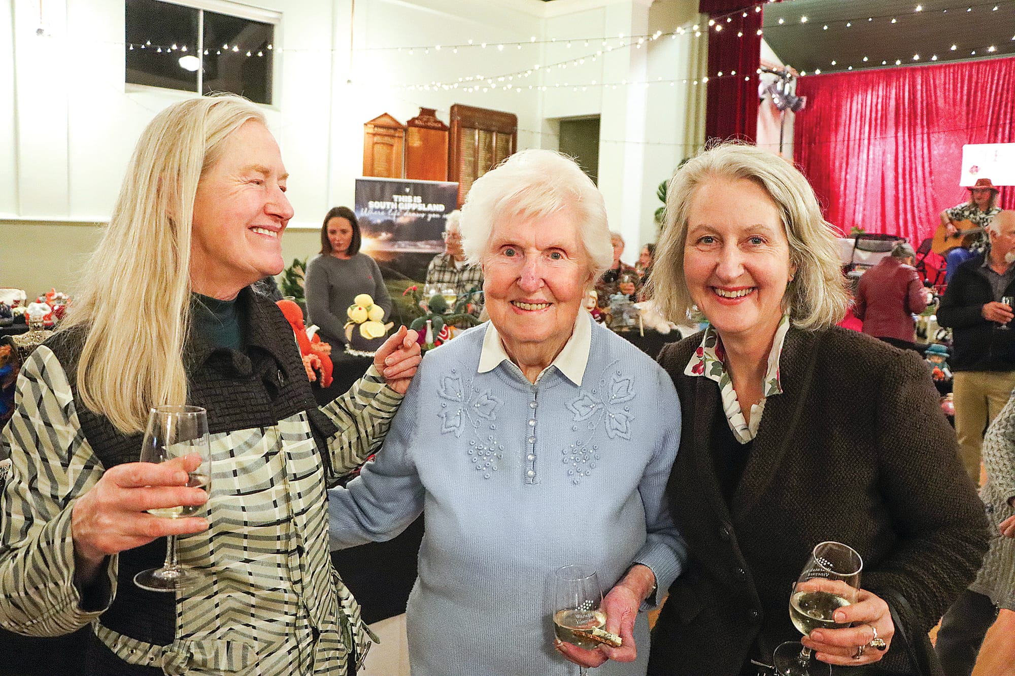 Heather Gibson and her daughters Michelle and Liane enjoy the opening night of the Fish Creek Tea Cosy Festival. A17_2124