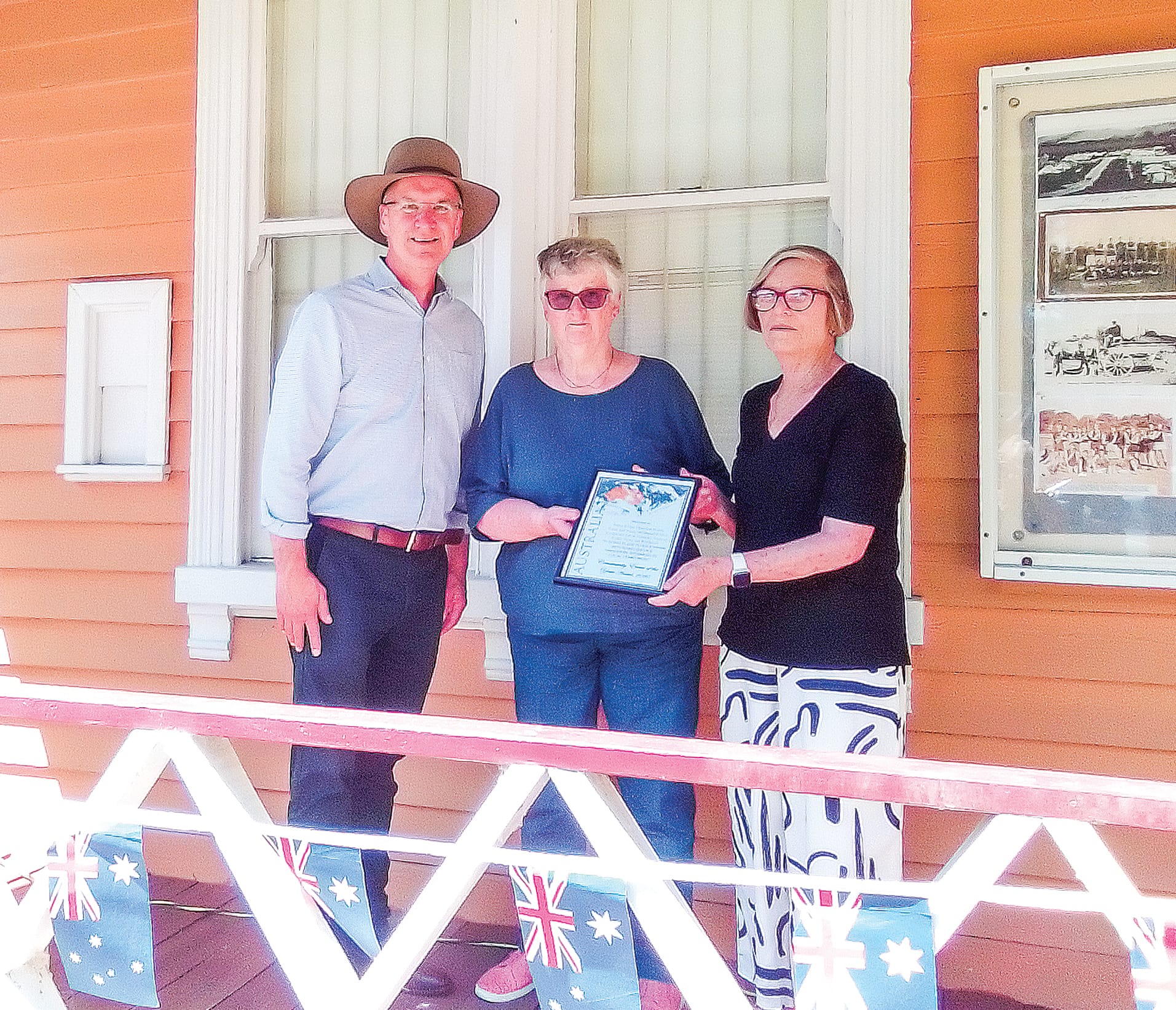 Danny O’Brian presents the Community Event of the Year award to Nola Taylor and Meg Rogers.