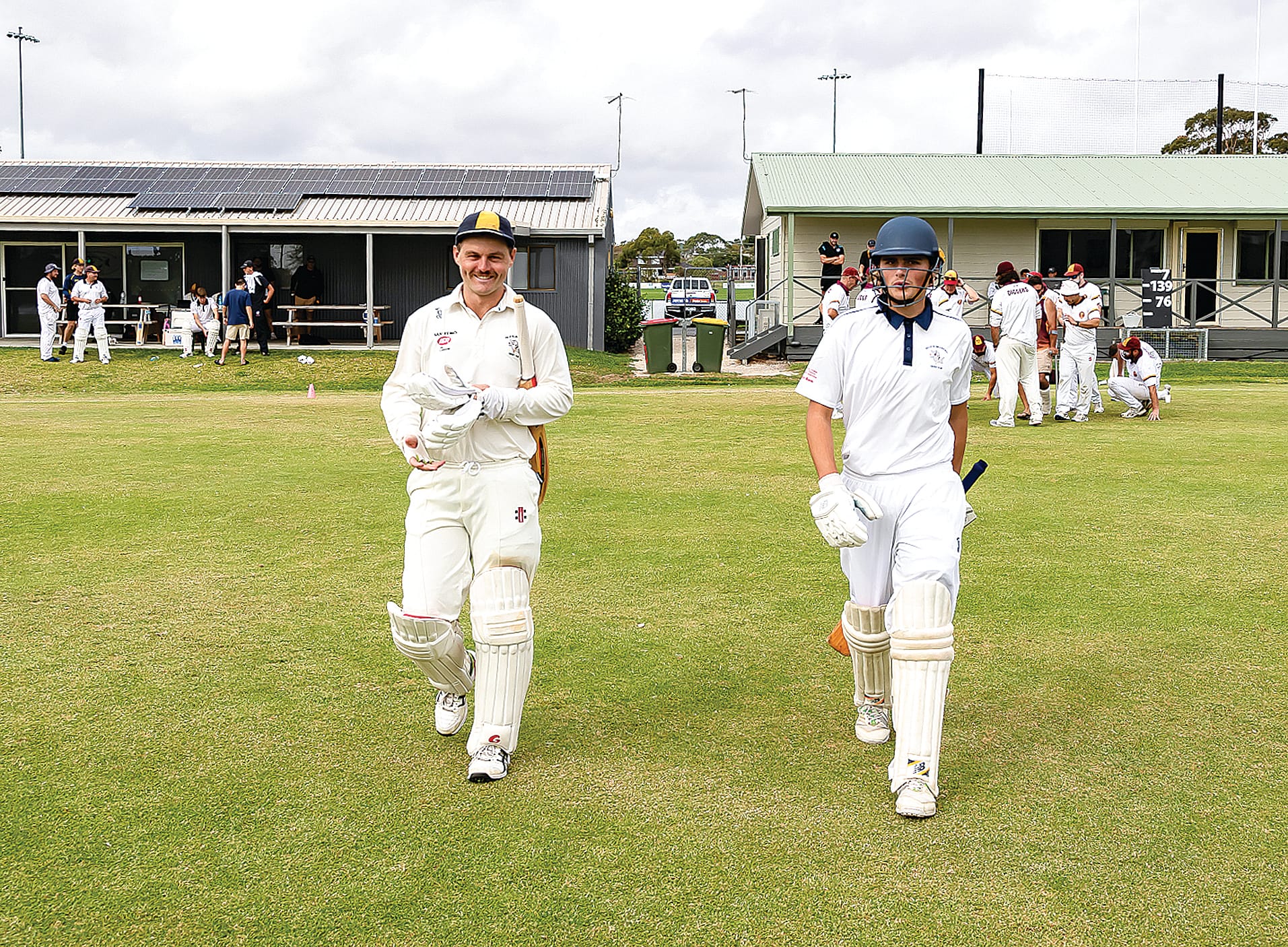 Brodie Johnston (left) and Tim Niven (right) resume their partnership after tea. The pair added an invaluable 60 runs. Photo: Peter Cleeland.