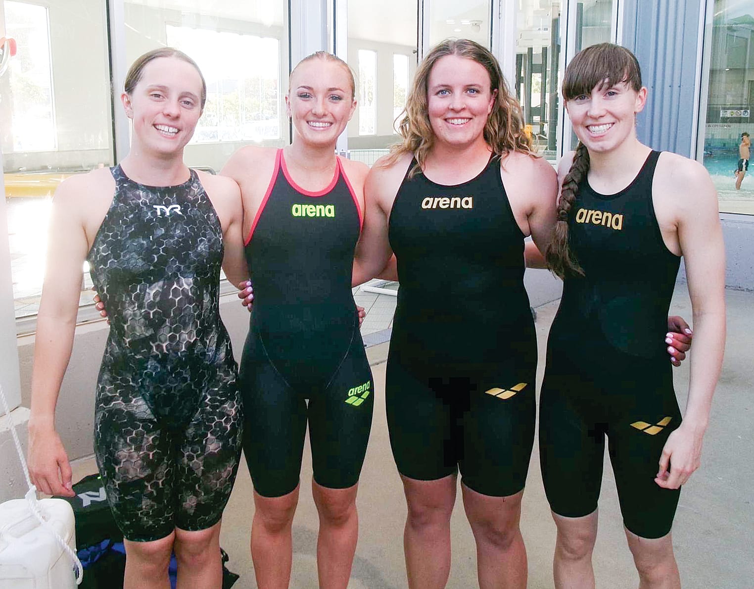 With nearly 30 years of country swimming experience between them, Trinity, Rahni, Tomei and Sophie are still all smiles at relay time.