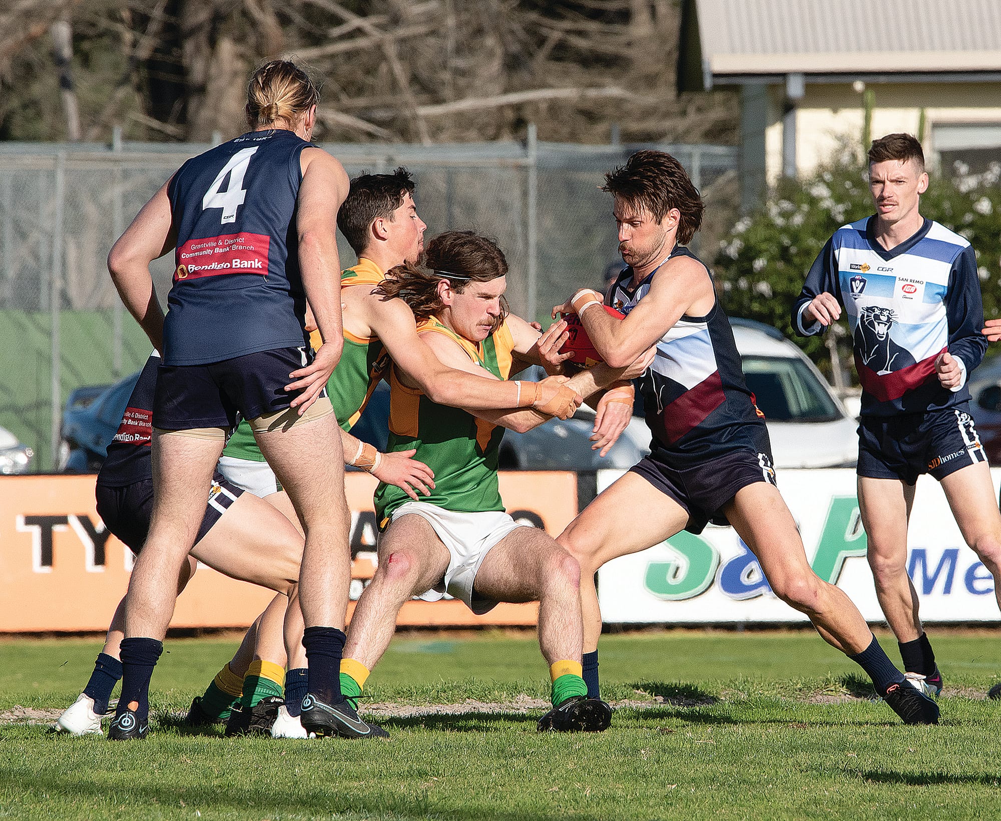 Kilcunda-Bass’ Cam McKenzie fights for possession against Garfield.