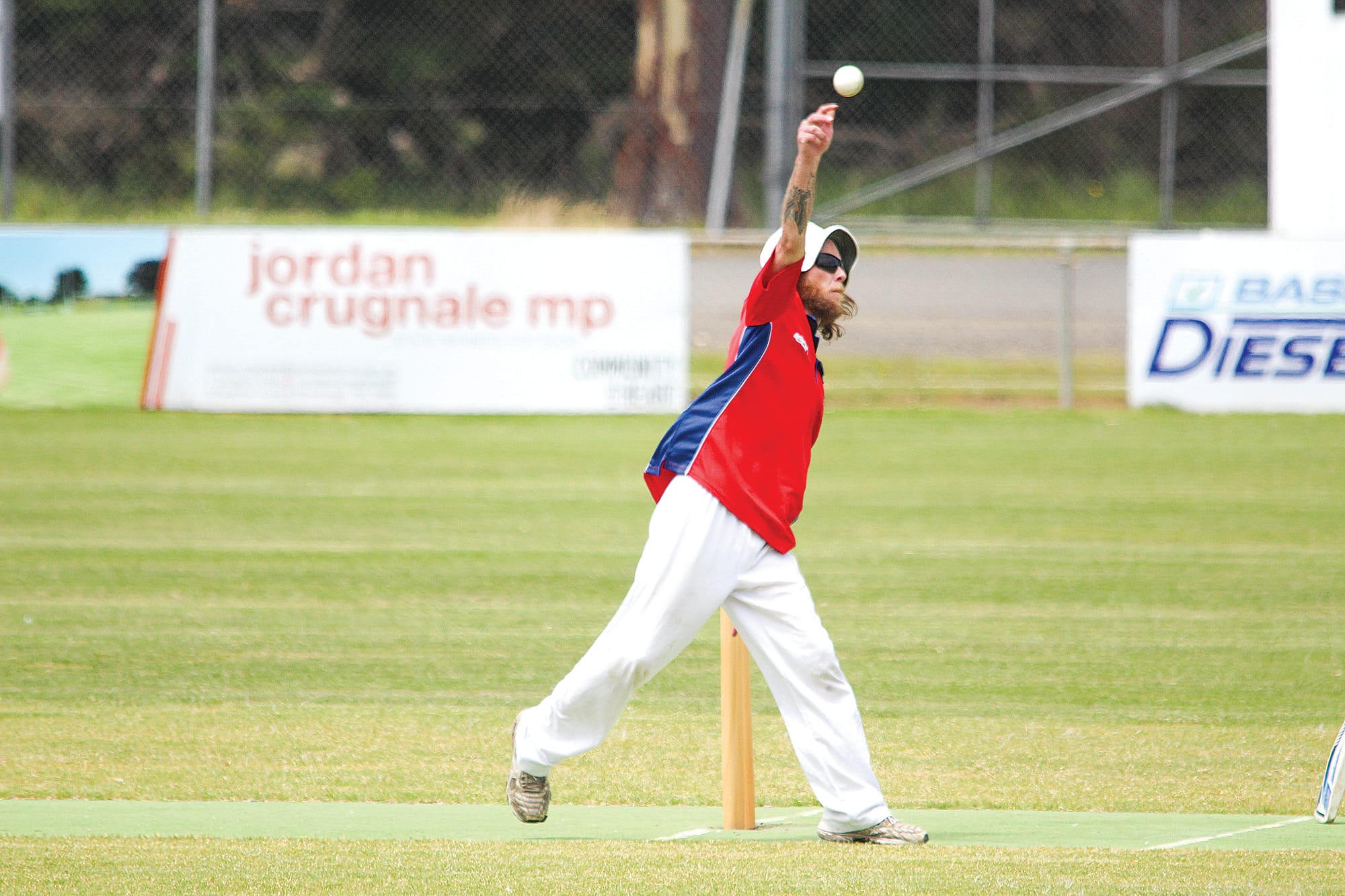 Matthew Grieve sends one down the Dalyston Recreation Reserve pitch on Saturday. B42_5022