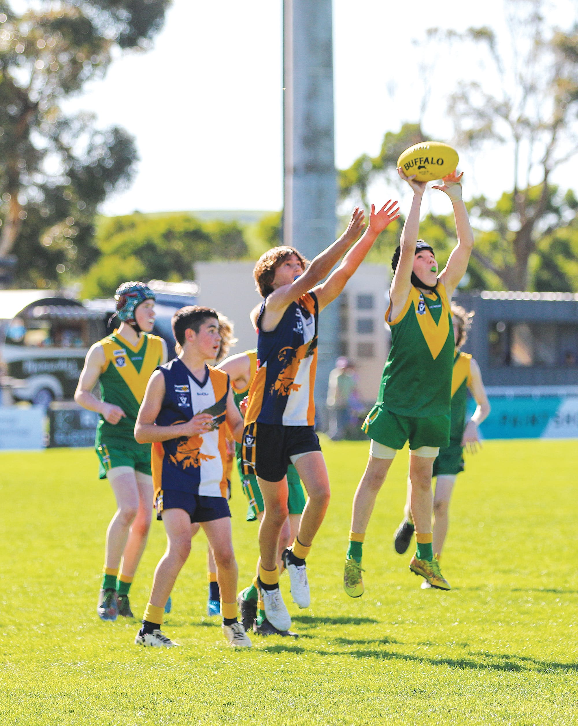 Leongatha’s Harrison Cooke takes an impressive grab in the U14 mixed grand final.