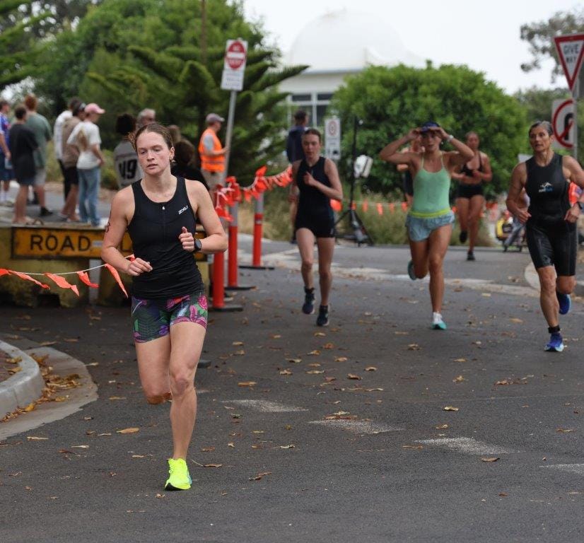 Second placegetter in the women’s event, Stella Crawford-Rust of Melbourne sets off on the 4km run leg of the aquathon.
