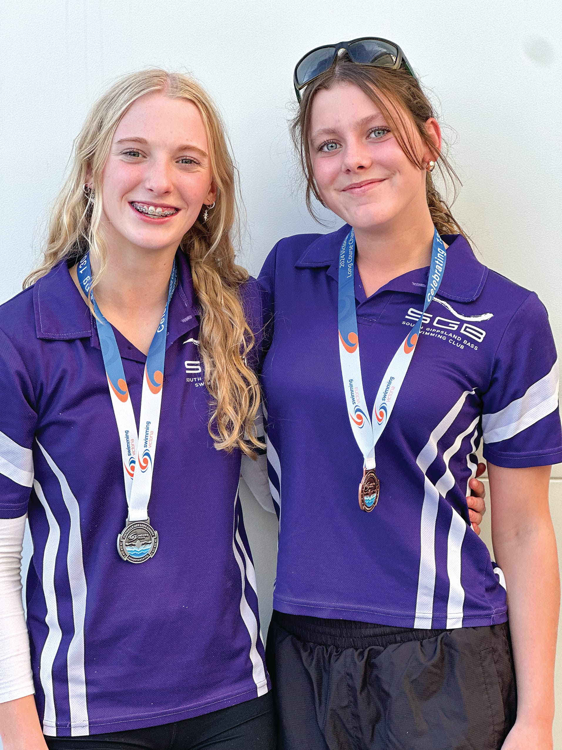 Rahni and Olivia celebrated their medals.