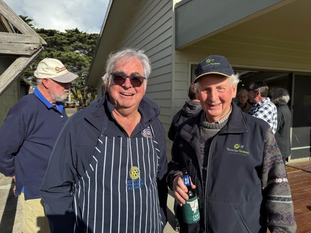 Phillip Island Rotary Secretary Graham Turner chats with Grantville farmers Graham Wood at the Farmers’ Picnic at the Ventnor Recreation Reserve on Sunday.