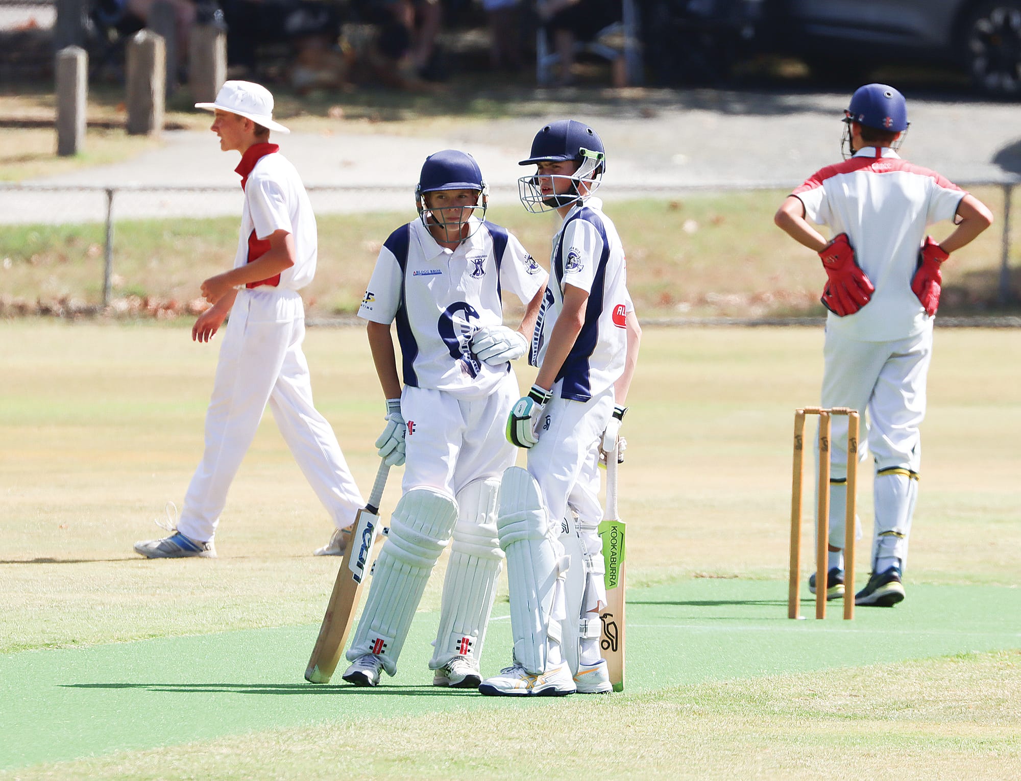 Korumburra-Nyora Captain Tyler Dole and fellow batsman Toby Nicholas meet in the middle to discuss strategy. W25_1025