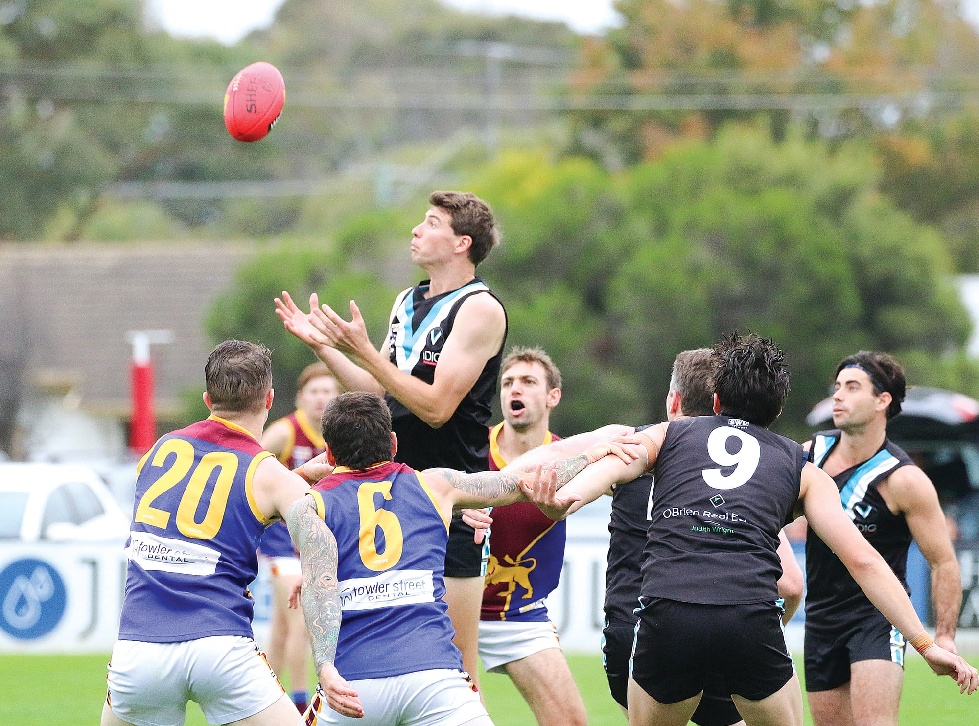 Toma Huther from Wonthaggi Power shoots up out of the pack to take possession of the ball. ob21_1723
