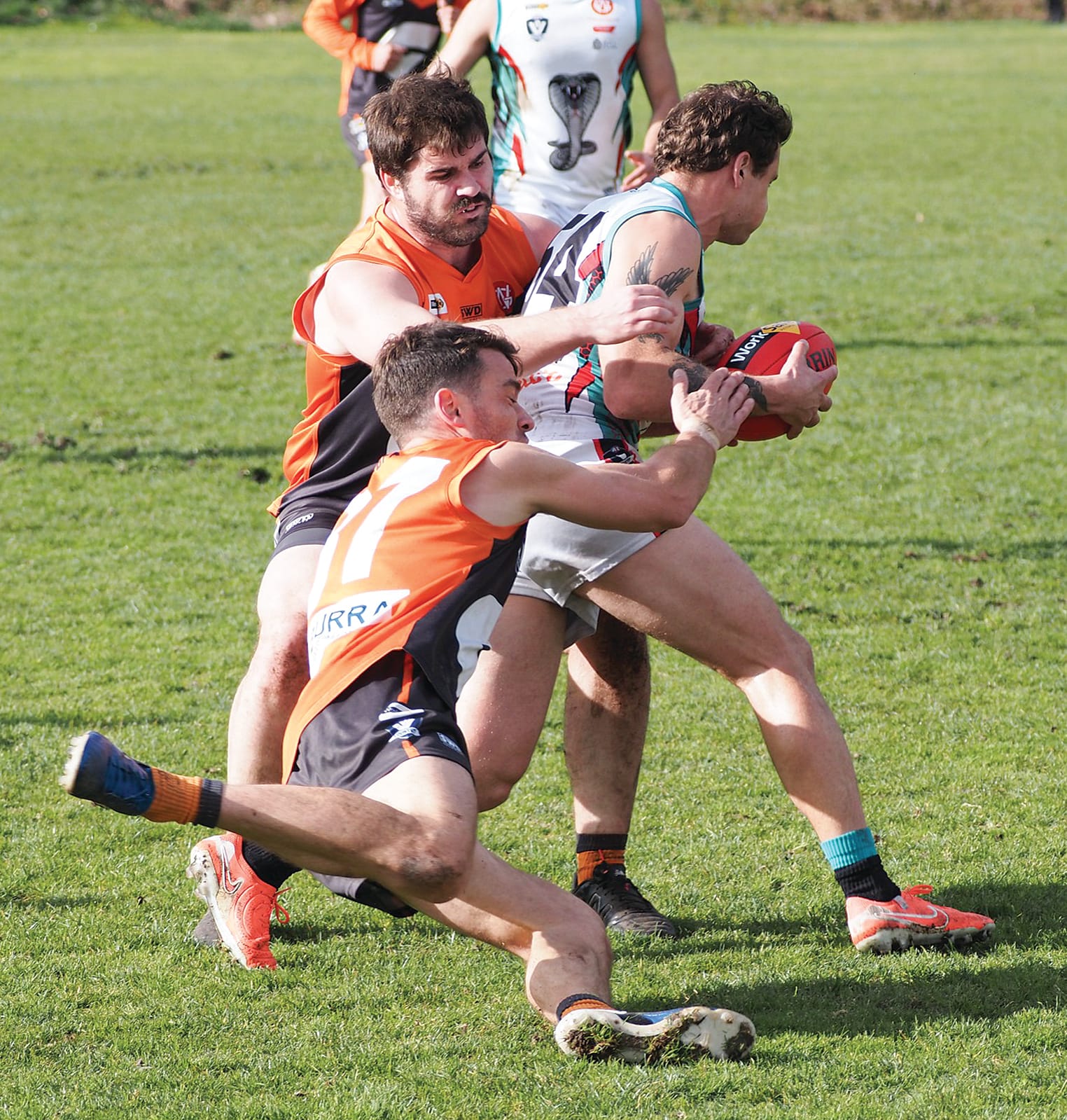Jordi Ceppi dive tackles his Cora Lynn opponent.  Photos: Rob Gardiner 