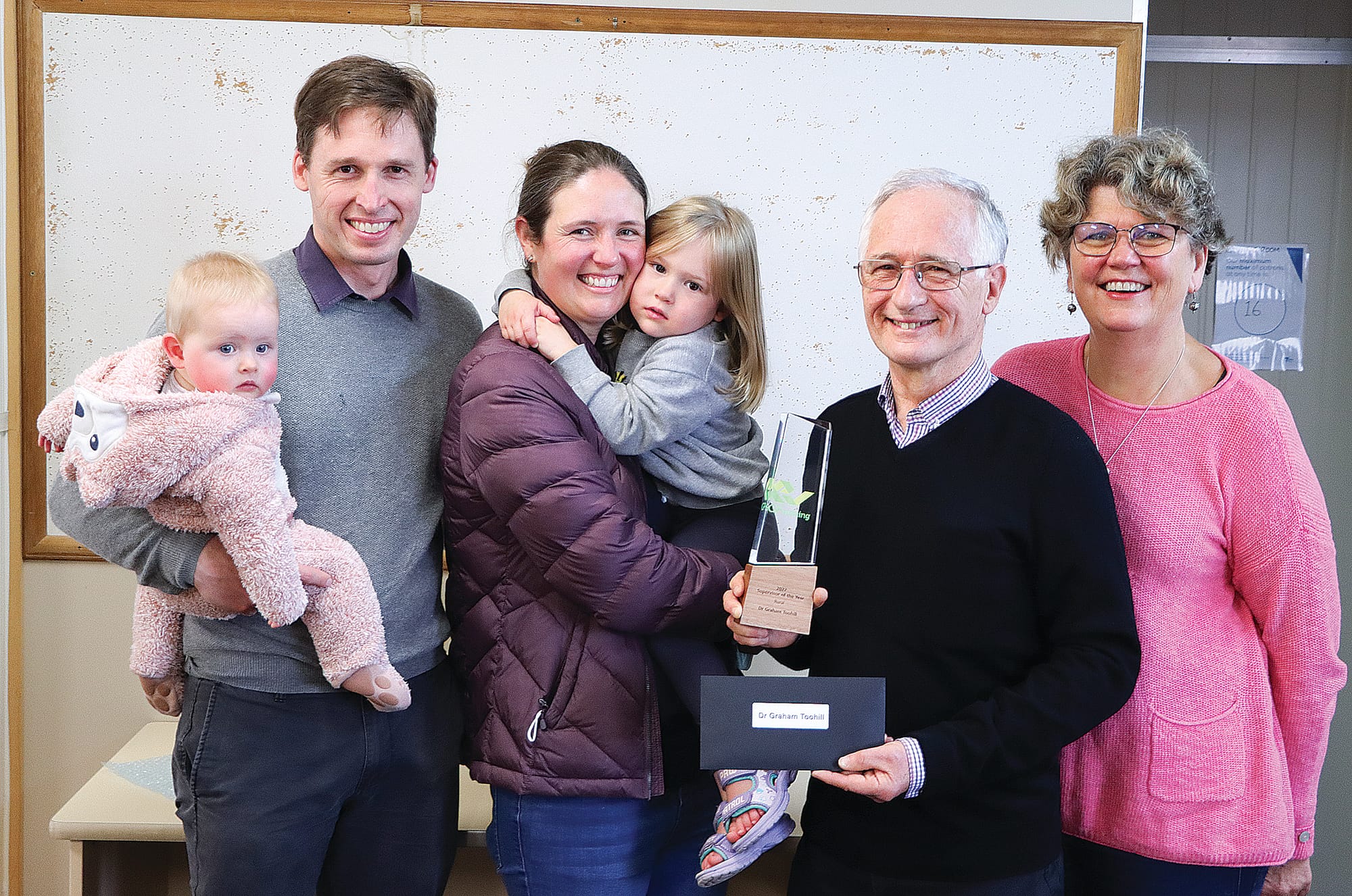 Dr Chris Ford and family with Rural Supervisor of the Year Dr Graham Toohill and his wife Sue. A05_4822