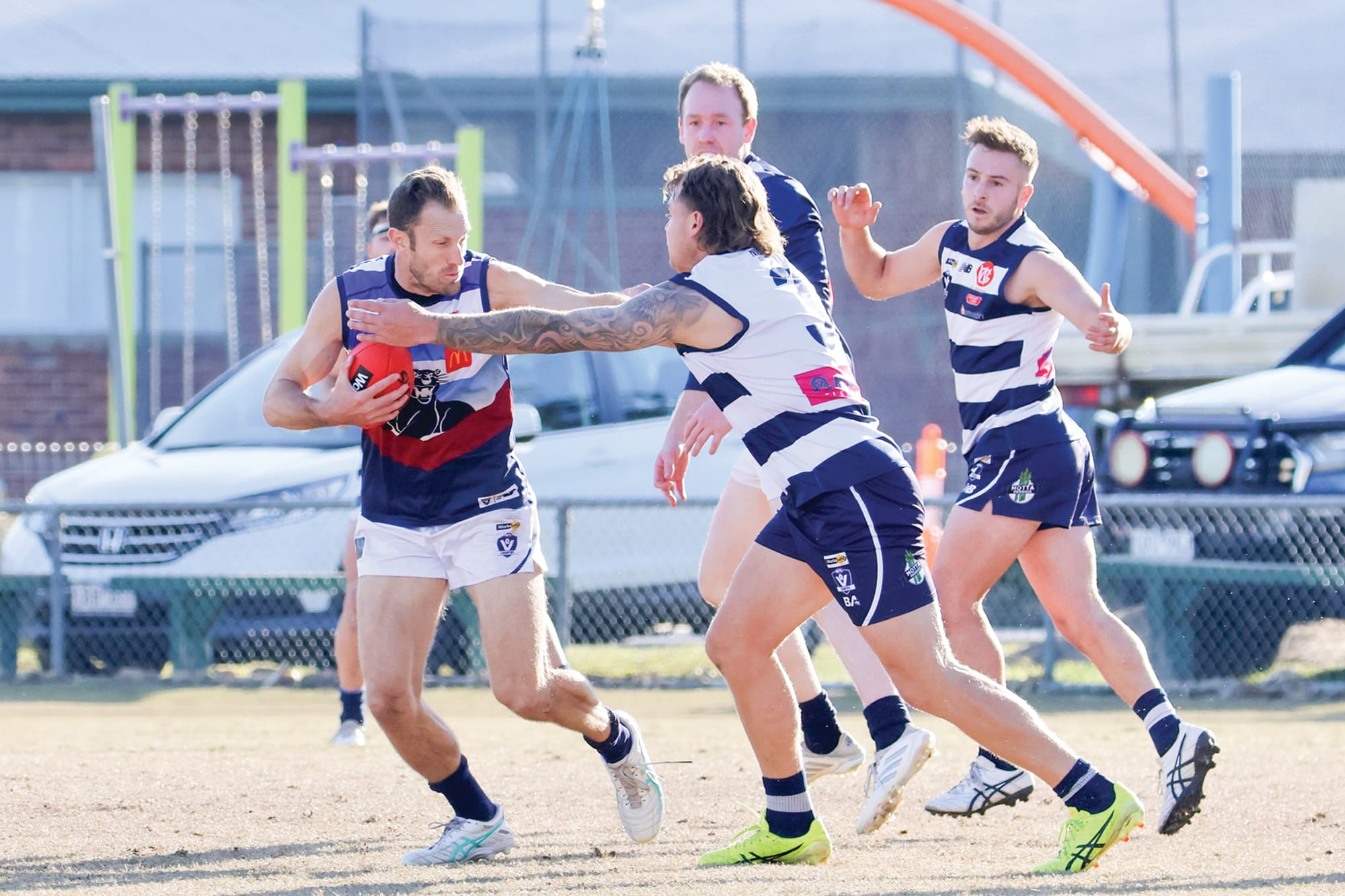 Travis Tuck shrugs off this tackle. 