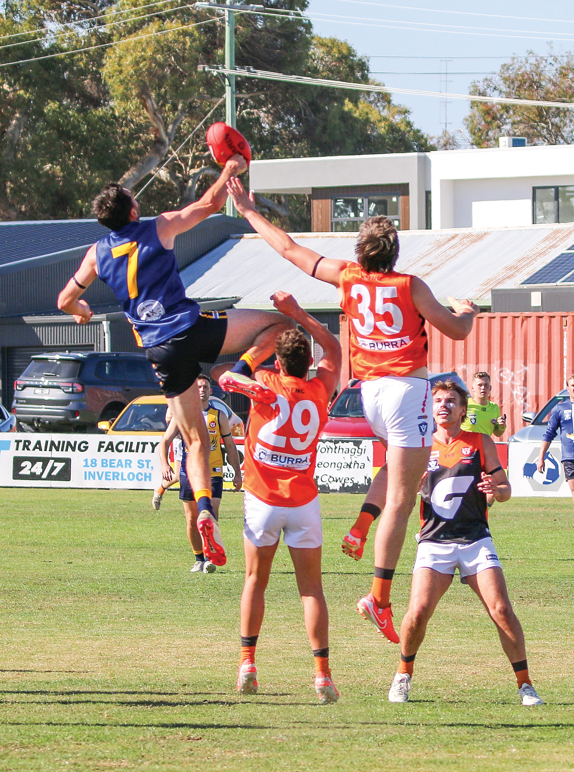 Dylan Clark and Will Croatto fly high to contest the ball. ob61_1525