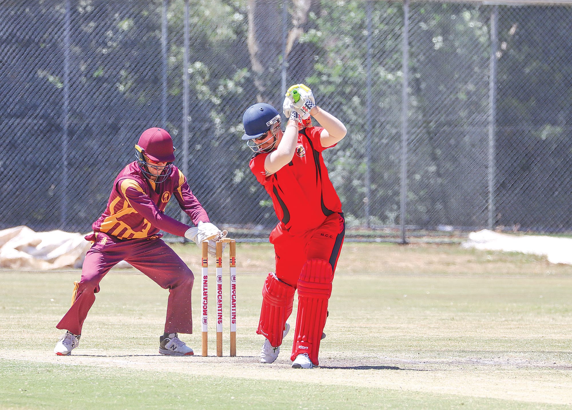OMK keeper Koby Brann takes a bail off but Nerrena’s Jack Curtis is firmly in his ground. A22_0425
