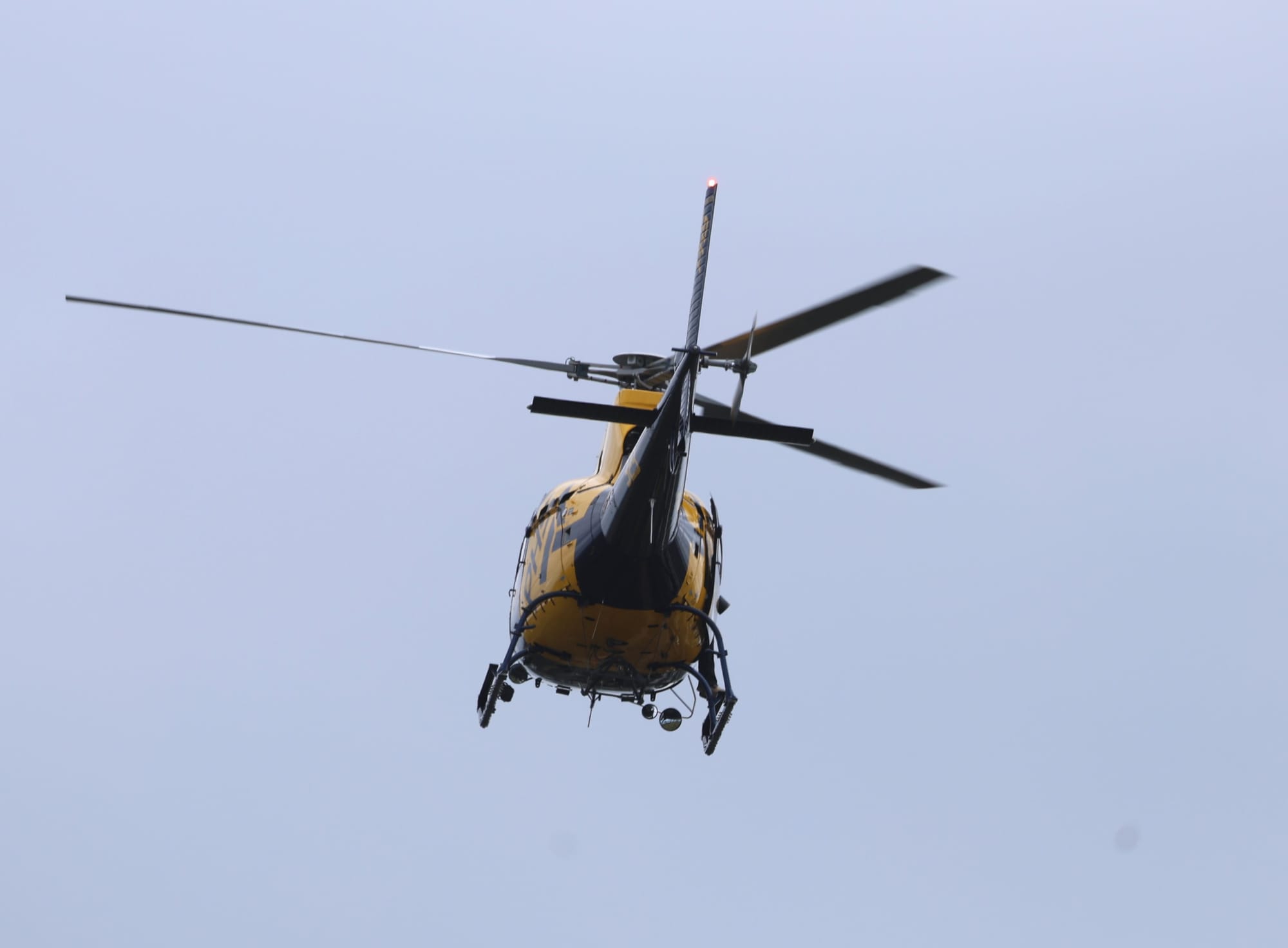 Ausnet helicopter hovering over Phillip Island on Thursday this week.