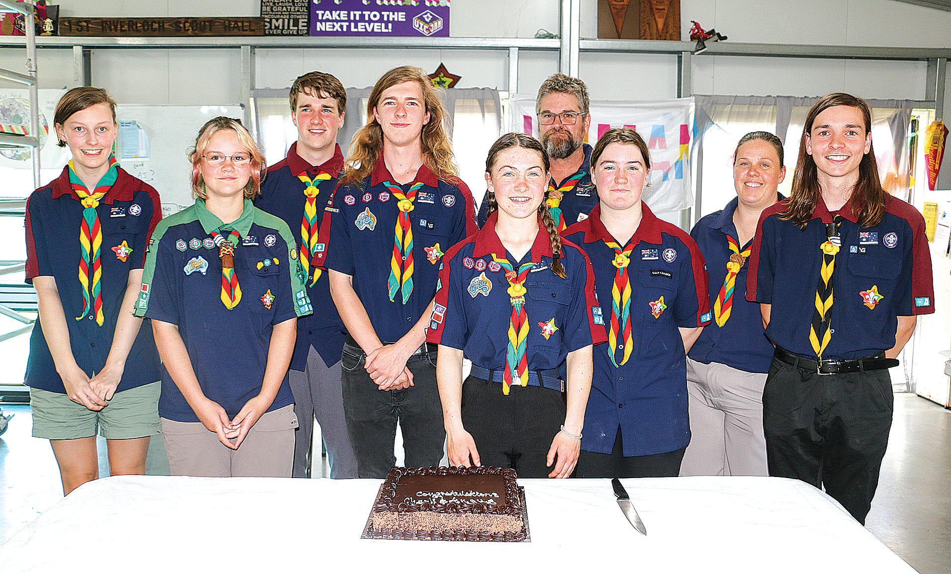 Tayla, Kei, Sam, Assistant Venturer Leader Brendan Eishold, Venturer Scout Leader Belinda Ogden and Tom congratulated Angus McMillan and Charli Ogden (centre) for receiving their Queen’s Scout. tkScouts04_0724