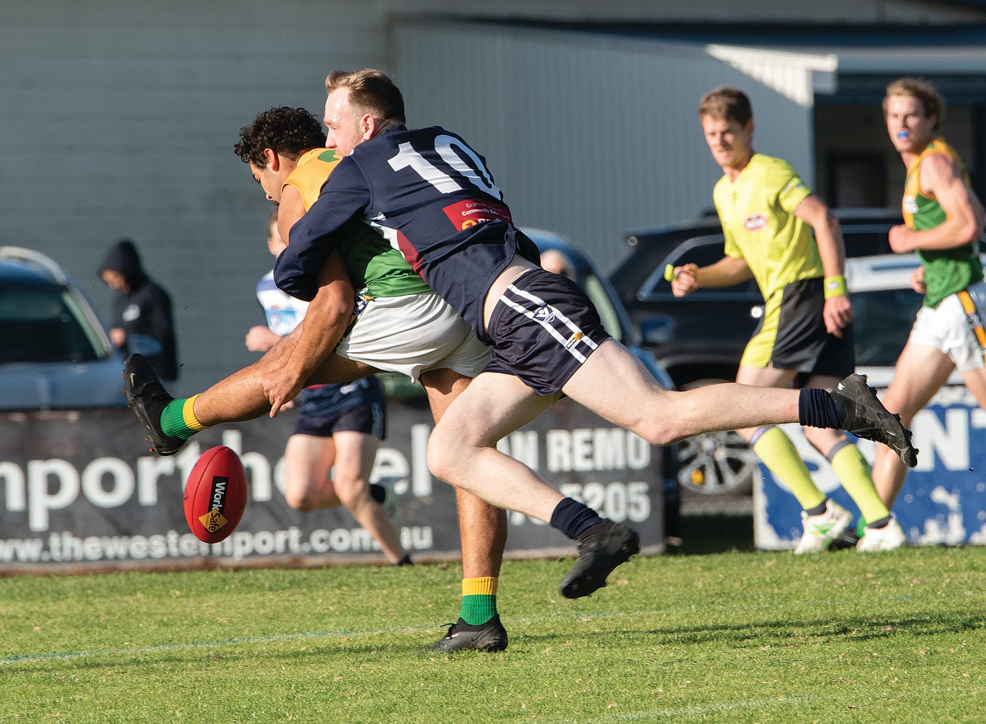 Kilcunda-Bass’ Dale Gawley applies pressure to his Garfield opponent. 