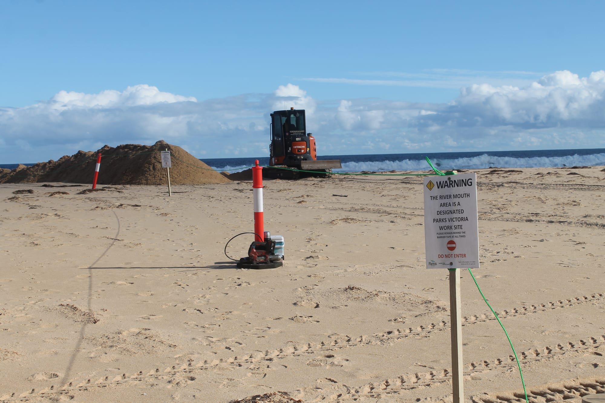 Dredging works are underway to open the mouth of the Powlett River after inundation of farmland upstream. B28_3125