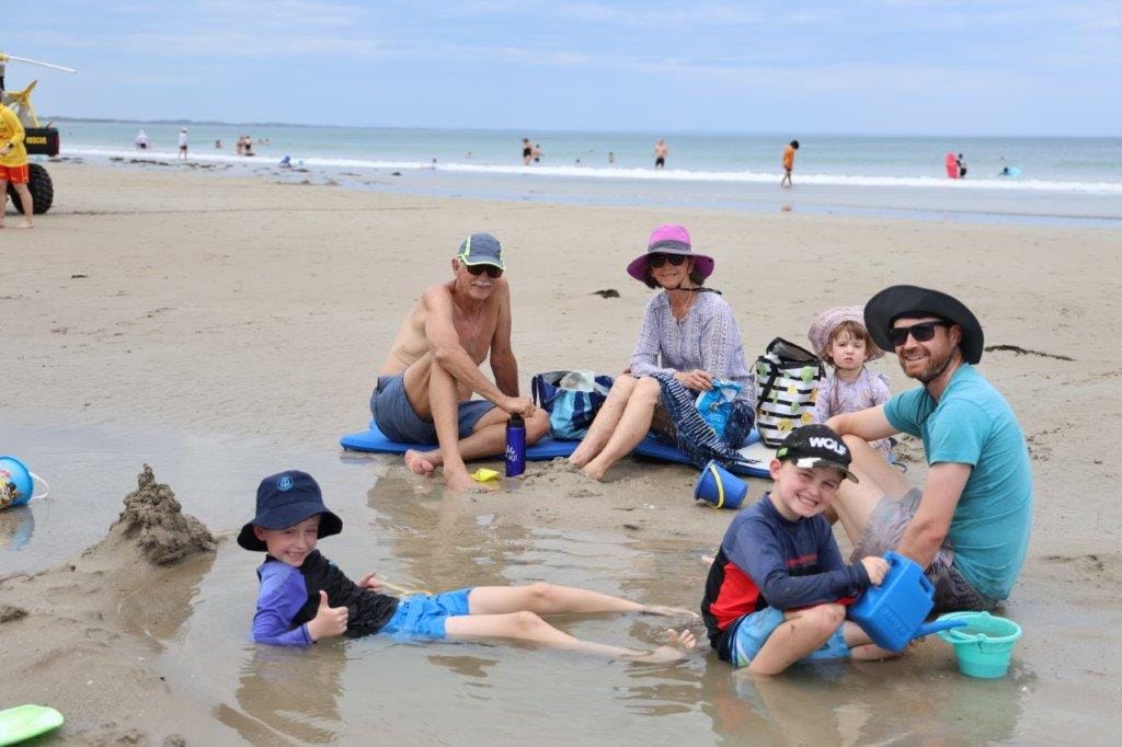 The Curran family of Traralgon relax on the beach at Inverloch in the heat of last Saturday.