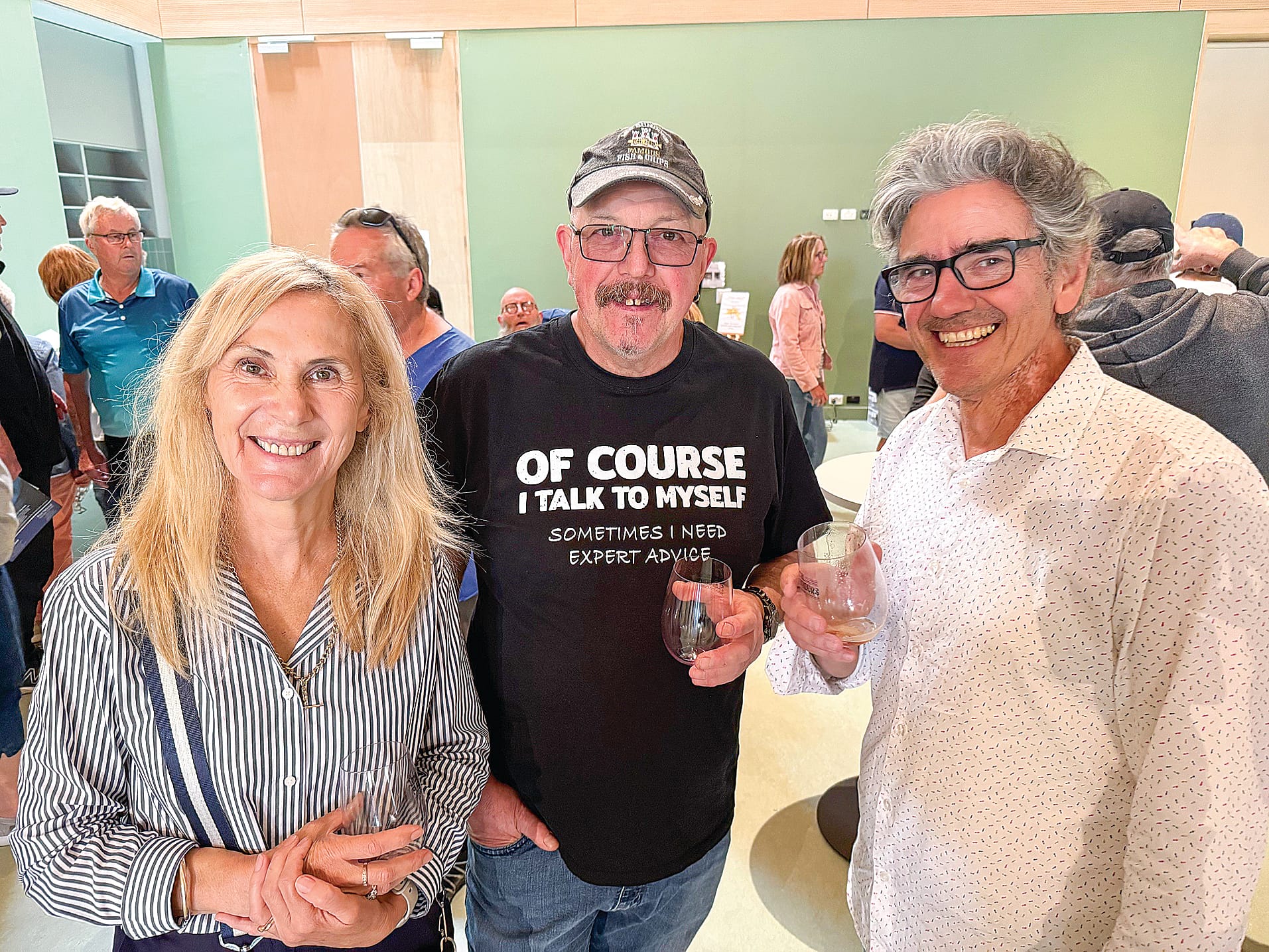 Cowes’ residents Debbie Capaul, Rod Silver and Daniel Capaul sample some of the fare at the Local Flavours Food & Drink Showcase at Berninneit last Sunday.