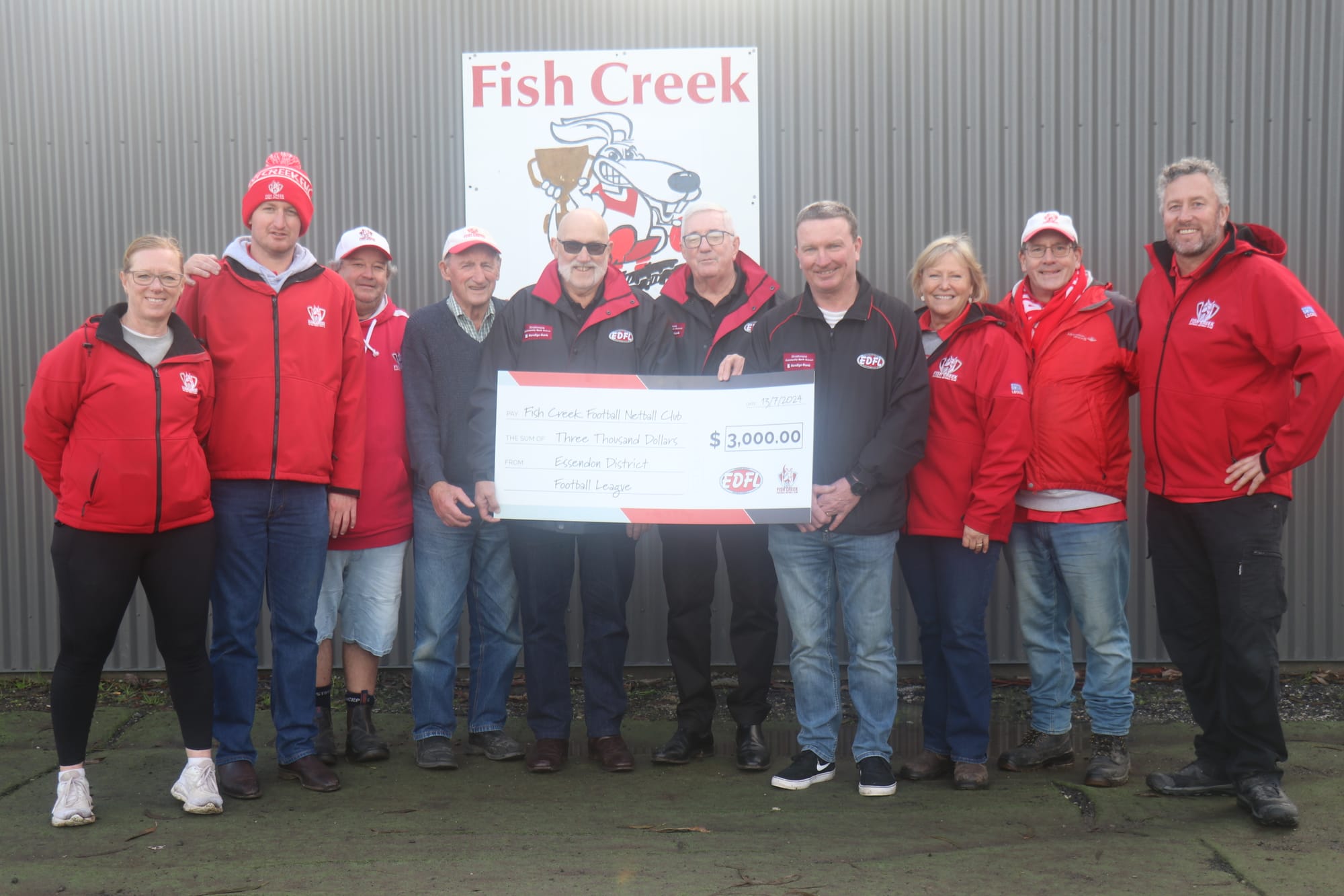 Essendon District Football League present Fish Creek Football Netball Club committee with $3,000 towards their new re-build of the clubhouse. 