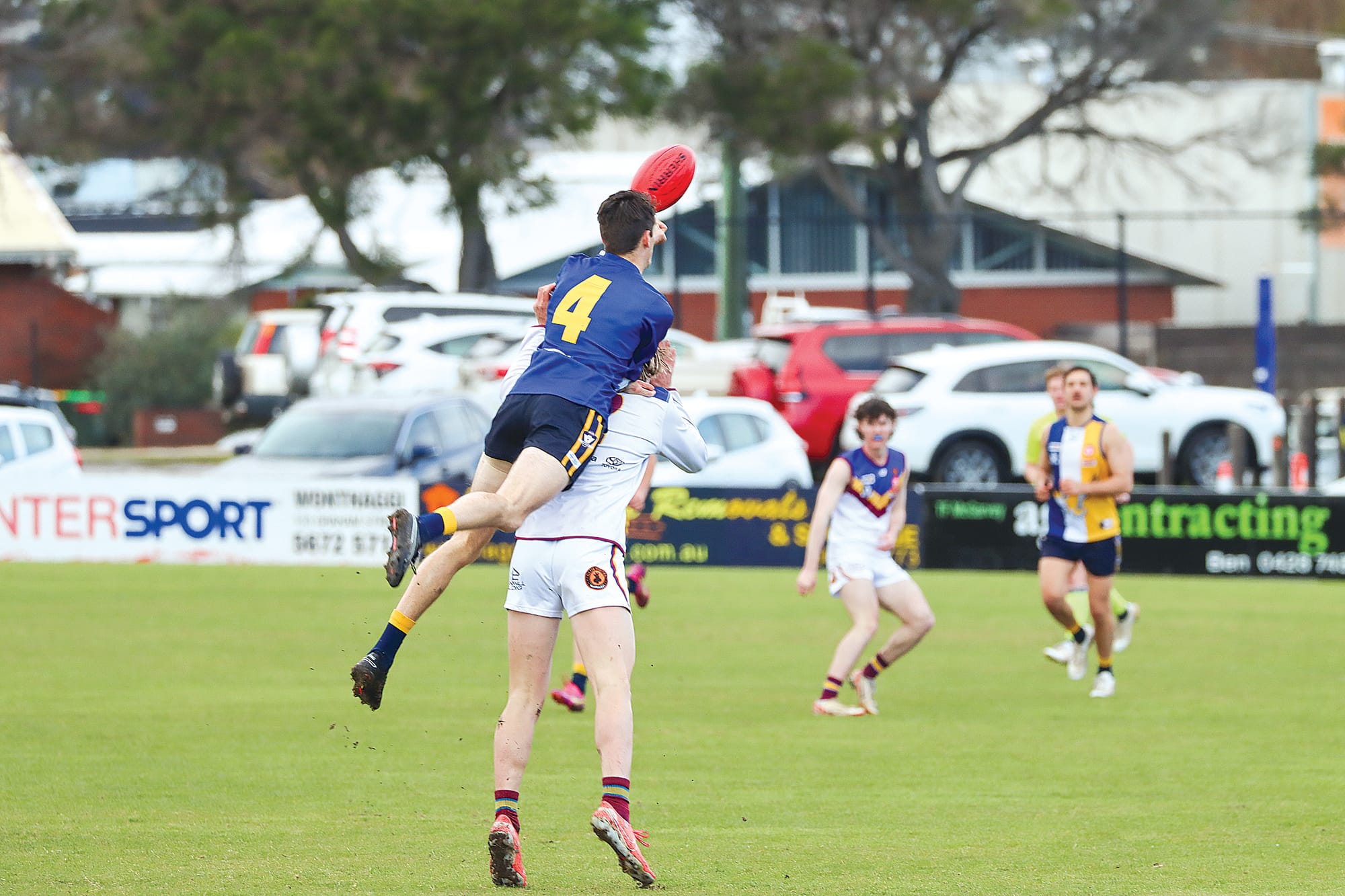 Inverloch Kongwak co-captain Lewis Rankin flies to spoil his Dusties opponent during the Sea Eagle’s 200th Senior game. A46_3325