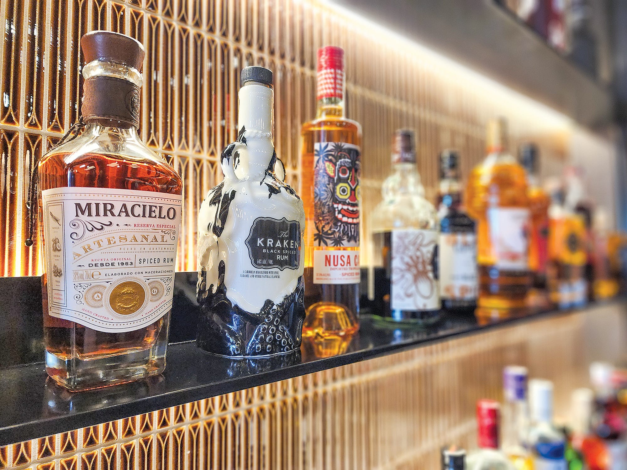 The speakeasy inspired space invites guests to indulge in timeless spirits and the art of mixology.