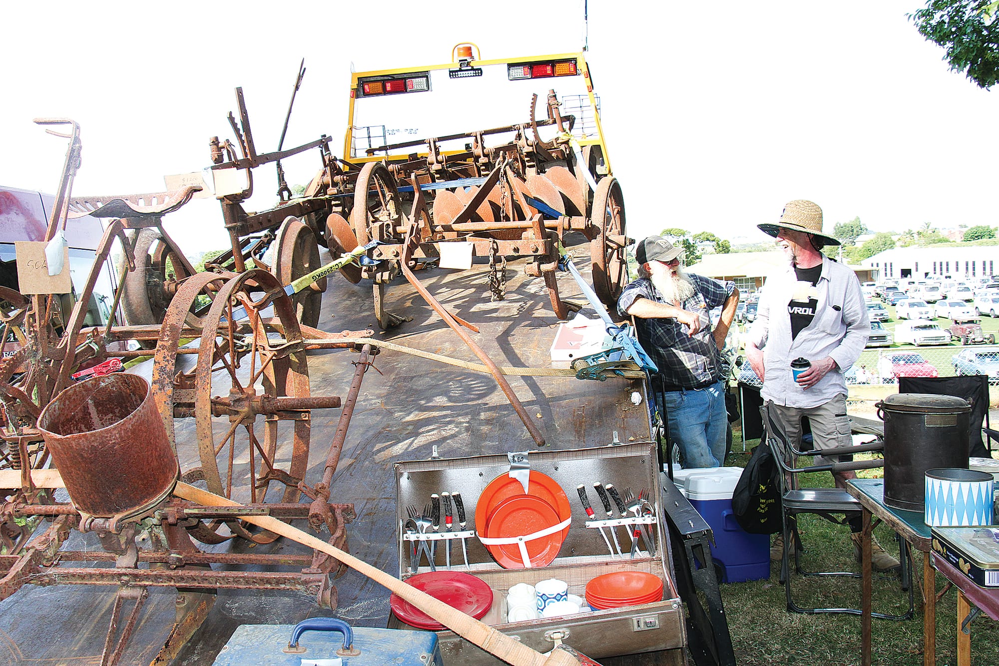 Geoff Hurst and Neil Checkley watching the shop for a friend at the Korumburra Swap Meet. B142_0225