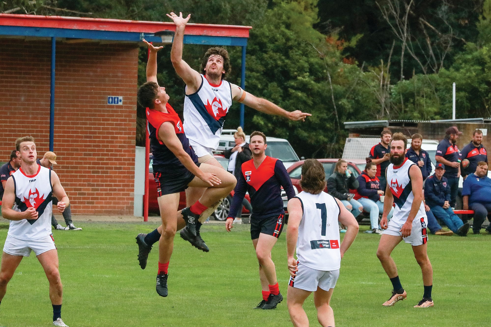 Michael Smith in a ruck contest with Jayden McCormack in the first half.