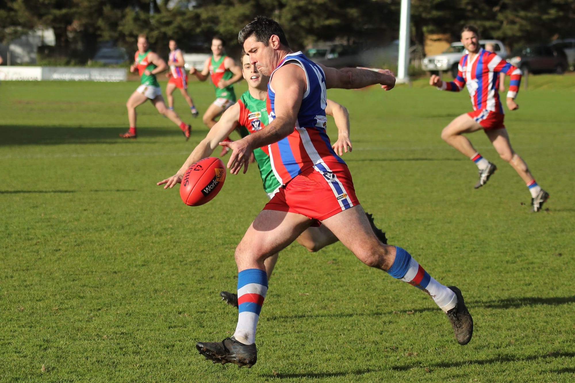 Damien Holmes looks to boot it.