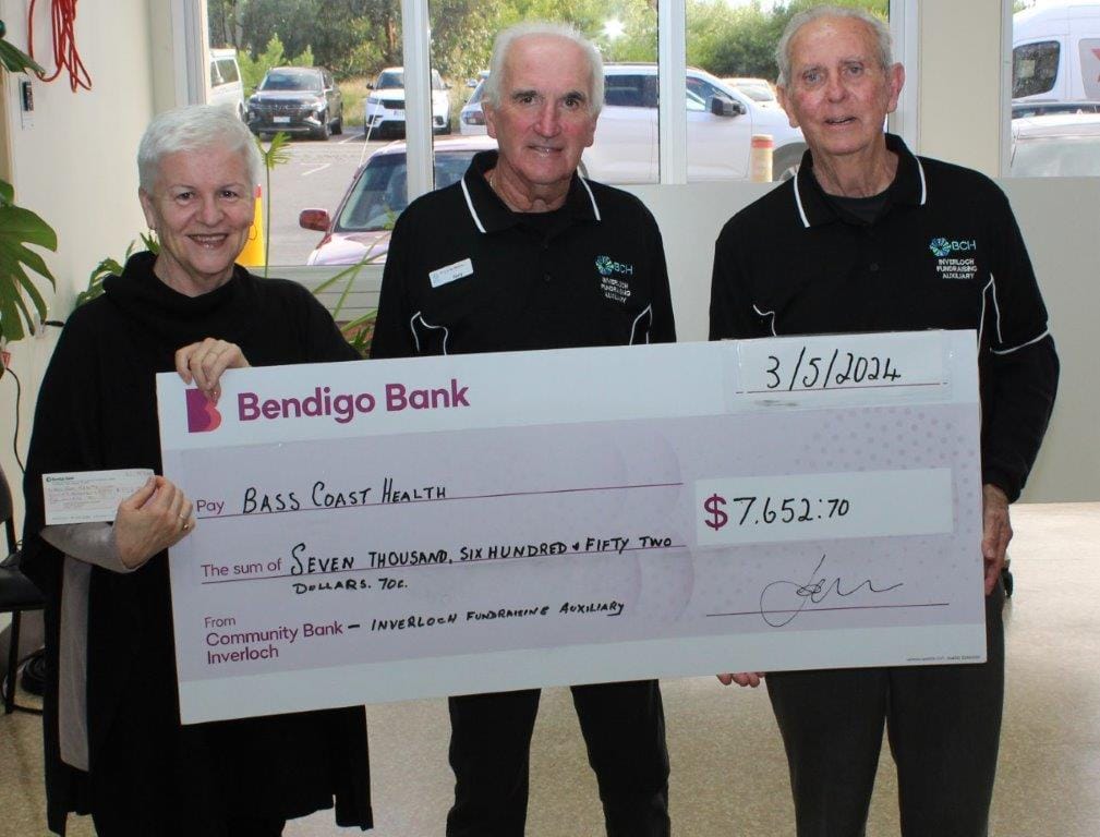 Inverloch Fundraising Auxiliary members Gerry Surridge and Terry Hall presented Bass Coast Health CEO Jan Child with a cheque for $7,652.70 to buy a shower trolley for aged care residents at Kirrak House, Wonthaggi.