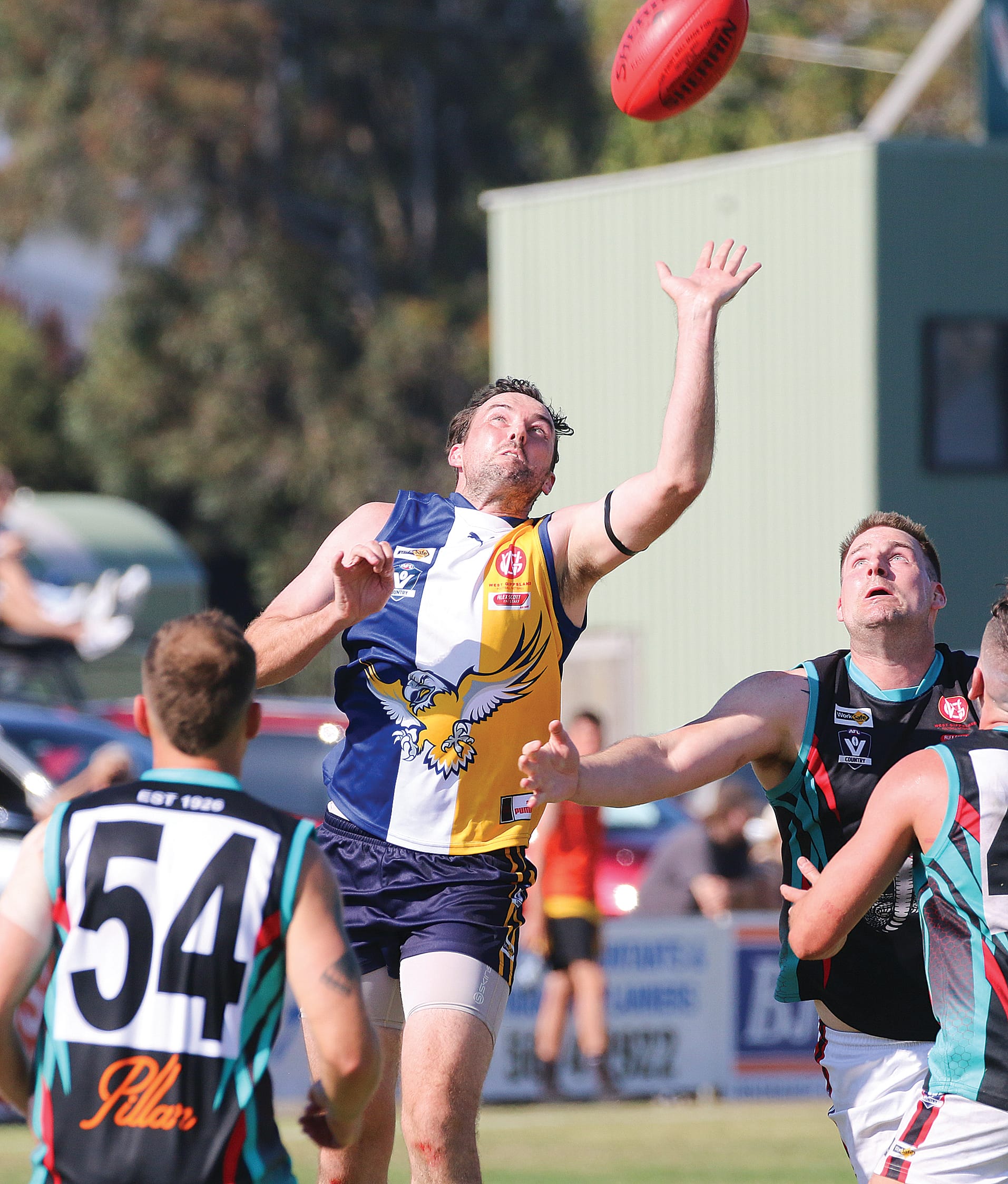 Inverloch-Kongwak’s Clinton McCaughan gets hands to the ball