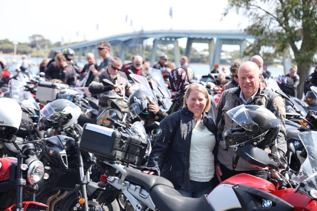 Tasmanian visitors Mandy Brown and John Pauley suit up for the Home Coming Ride across the San Remo Bridge ahead of the weekend’s Motorcycle Grand Prix.