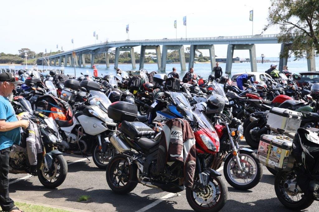 A huge crowd of riders assembled under the bridge at San Remo, in glorious sunshine, ahead of the Home Coming Ride to the Phillip Island Circuit on Thursday.