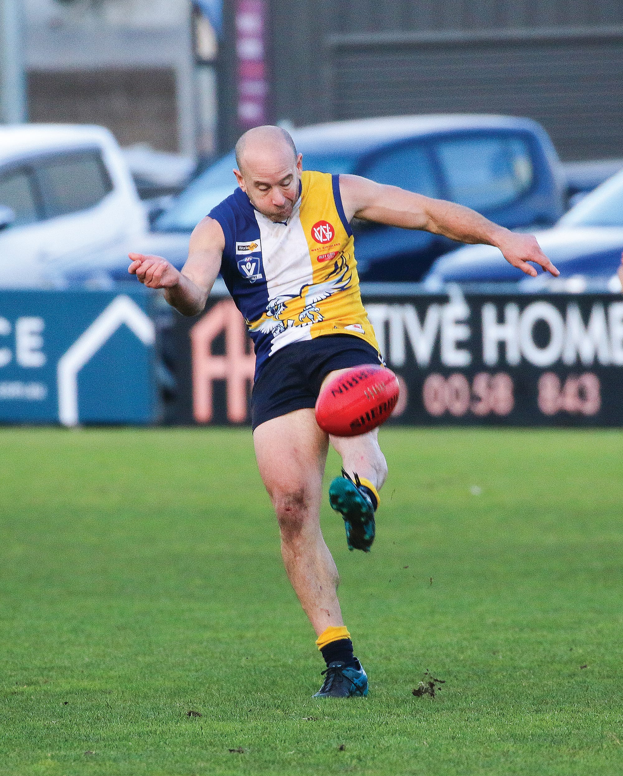 Andrew Soumilas sends the ball towards Inverloch Kongwak’s forward line.