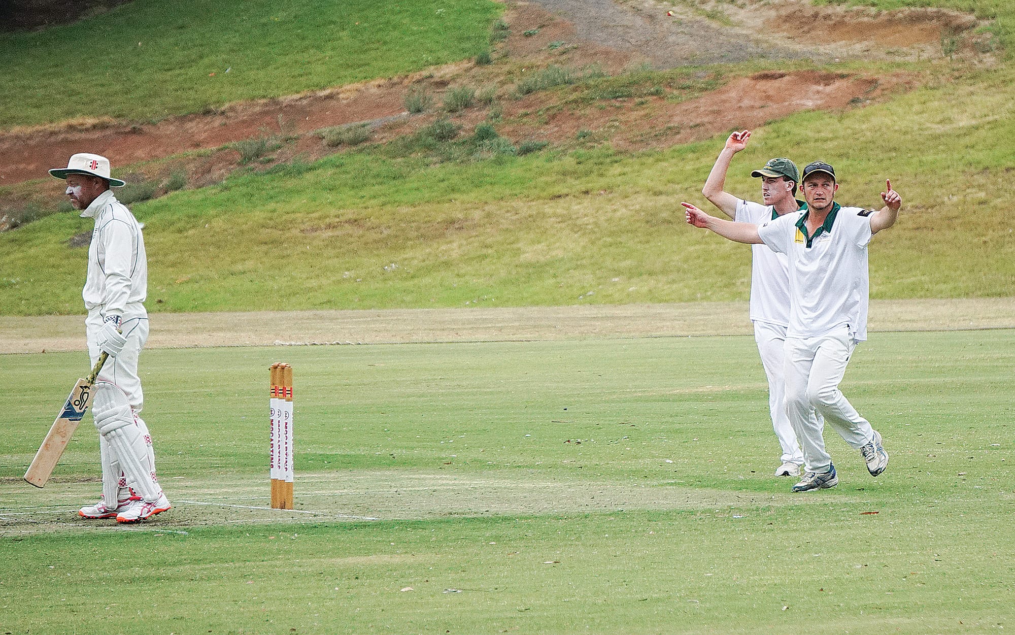 Leongatha Town celebrate a run out.