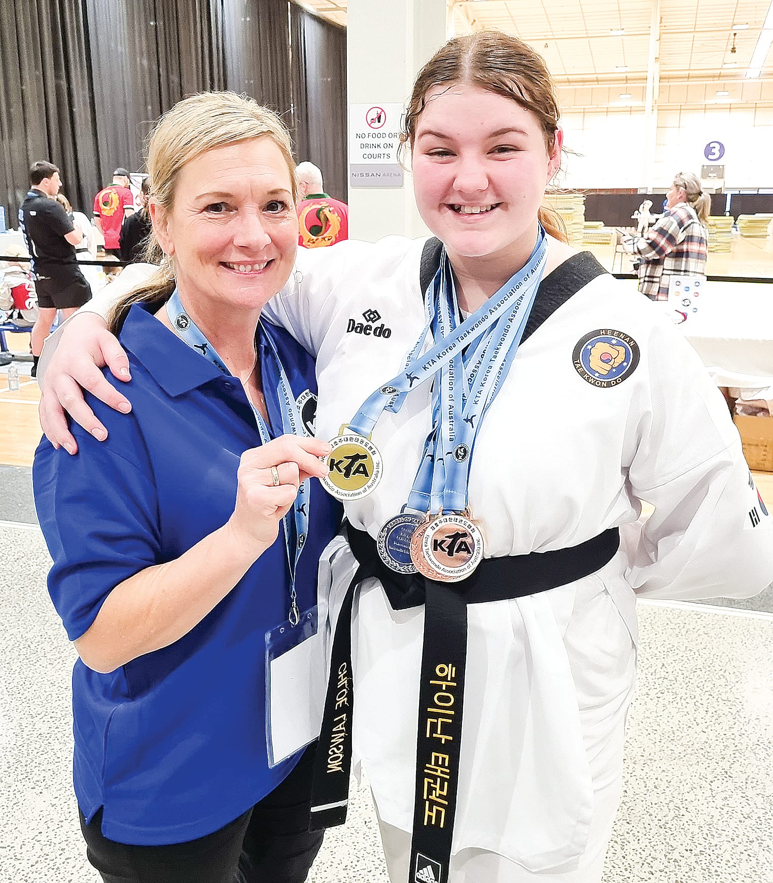 Mentor, coach and owner of Heenan Taekwondo, Cassandra Heenan with Chloe Lawson. 