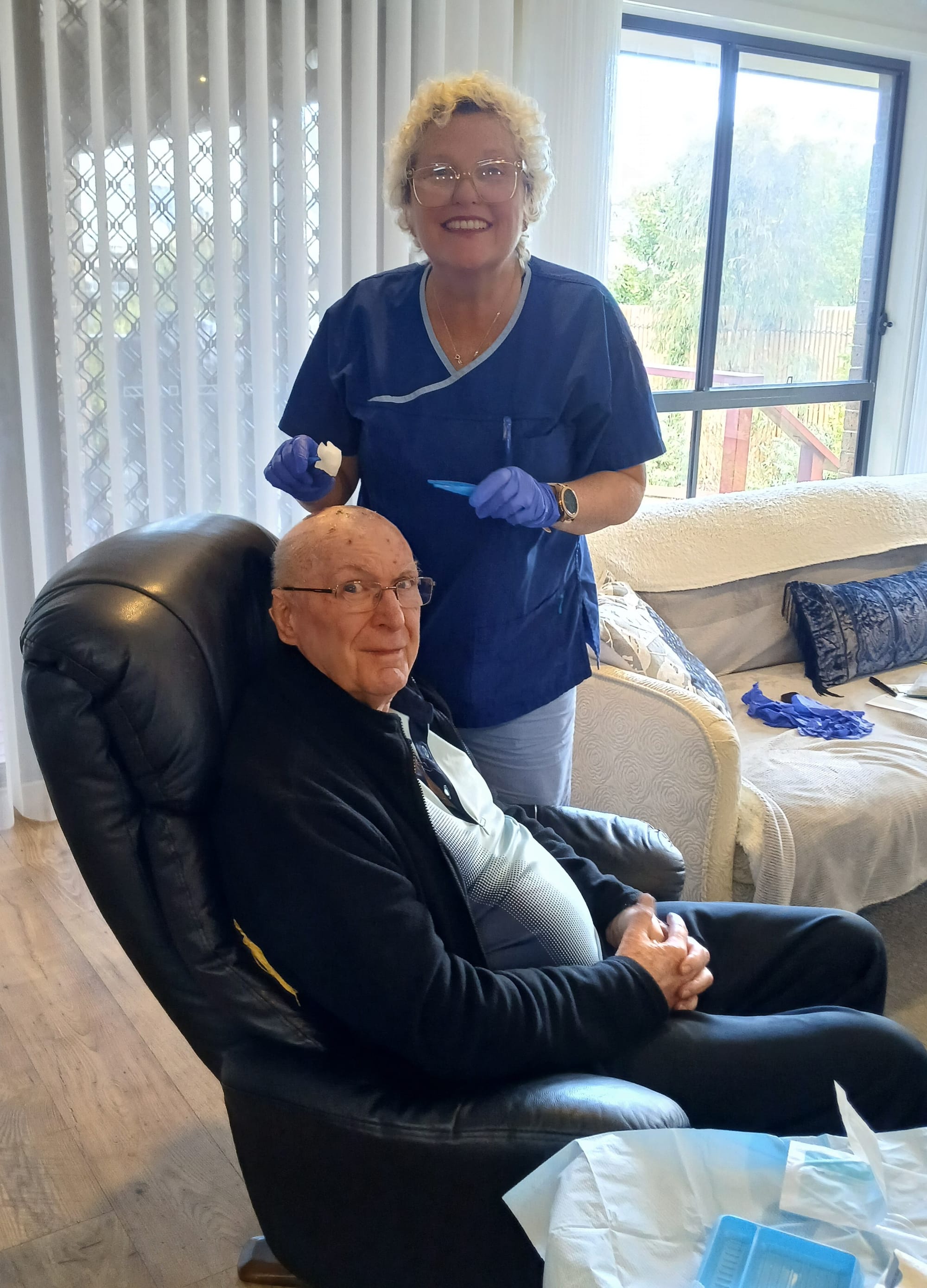 Bass Coast Health District Nurse Maryanne Plenkovich provides care to client Mervyn Jones in his home. 