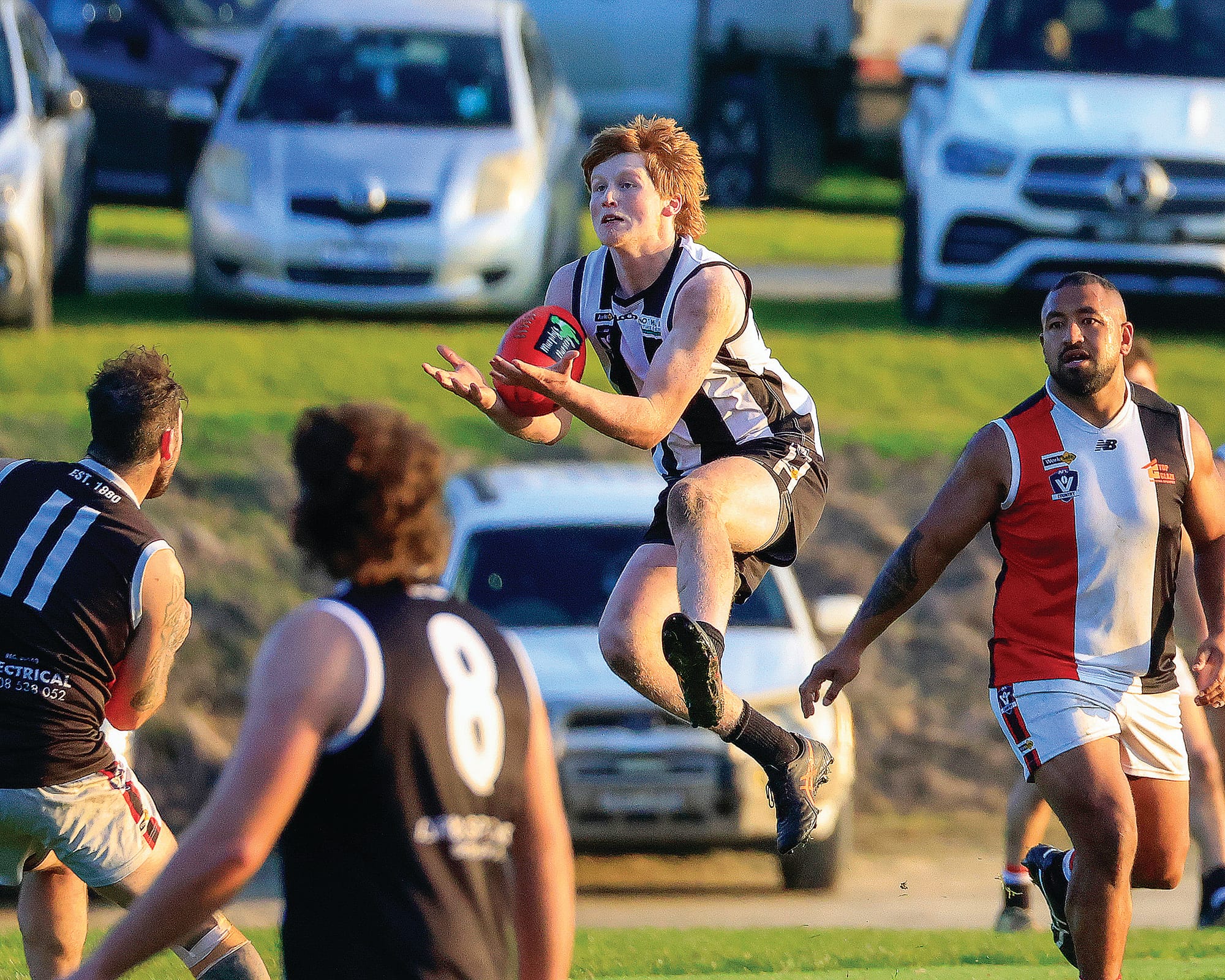 Bryce Broadmore lands a beautiful mark for Poowong. Photo: Jeff Tull.