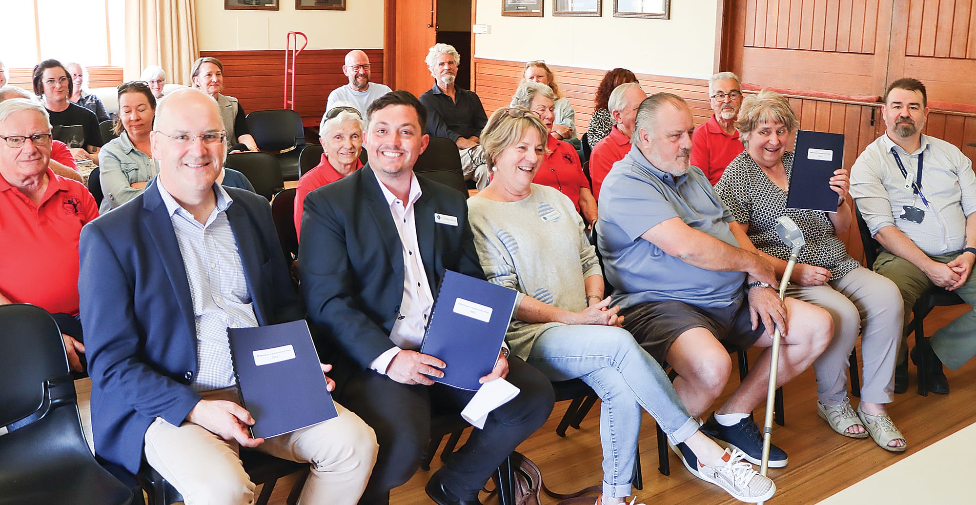 Member for Gippsland South Danny O’Brien, South Gippsland Shire mayor Nathan Hersey and retired community strengthening officer Barbara Look hold copies of the new Meeniyan Community Plan. A12_4223
