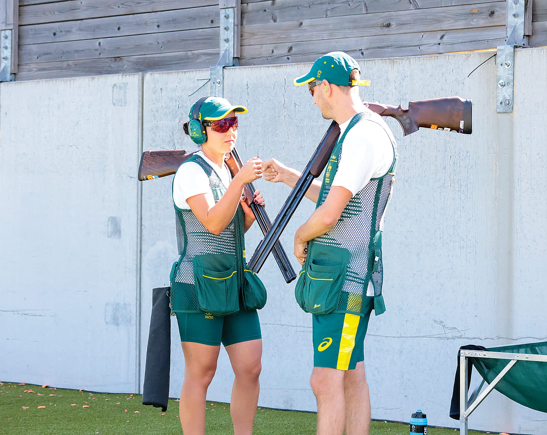 Aislin and Josh pump each other up between shots. Photo: Nathalie Gallois ISSF.