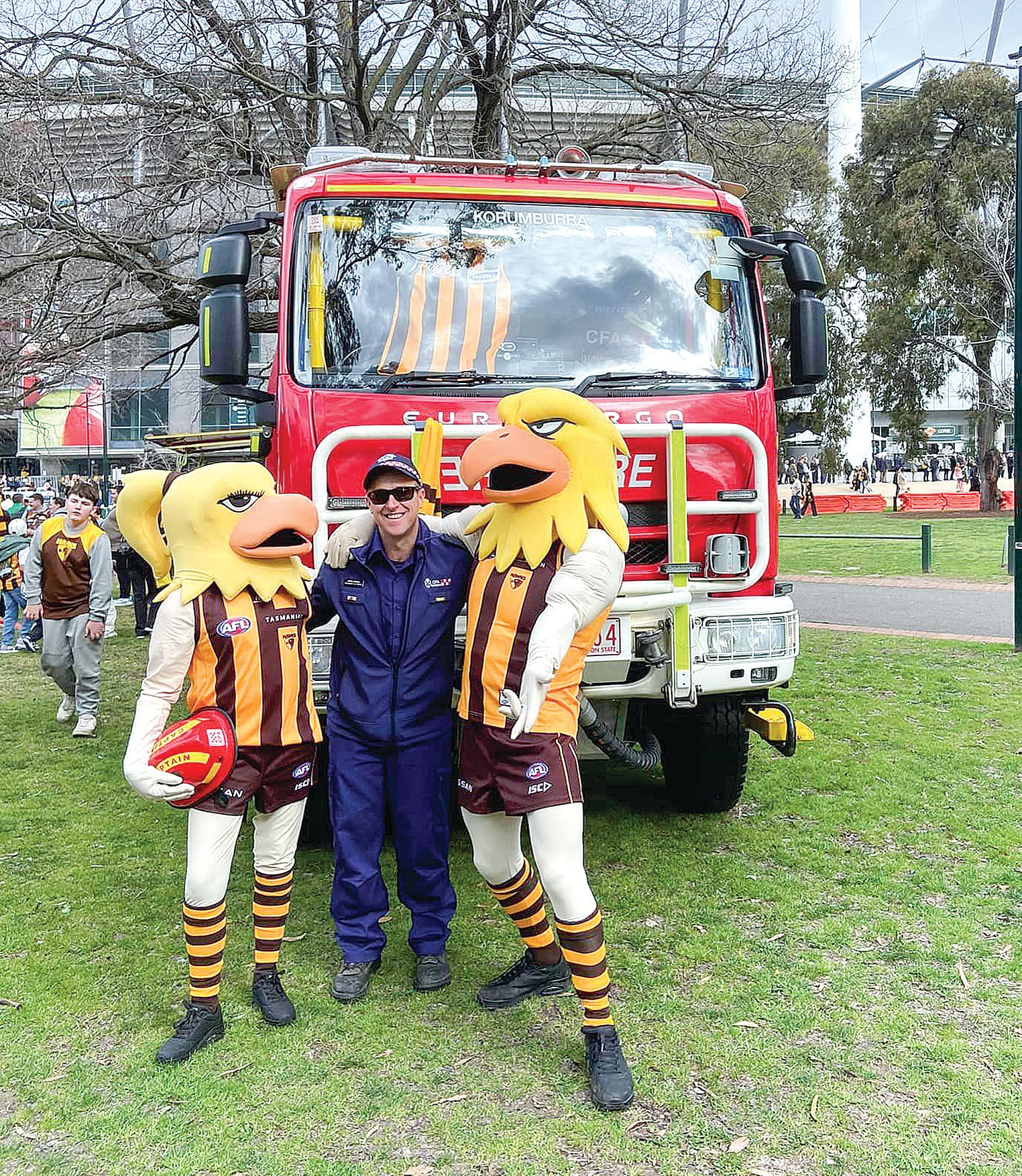Brigade Captain Shane Maskell and fifty-year service award recipient Bill Rodda with CFA Catchment Commander Gavin Parker.